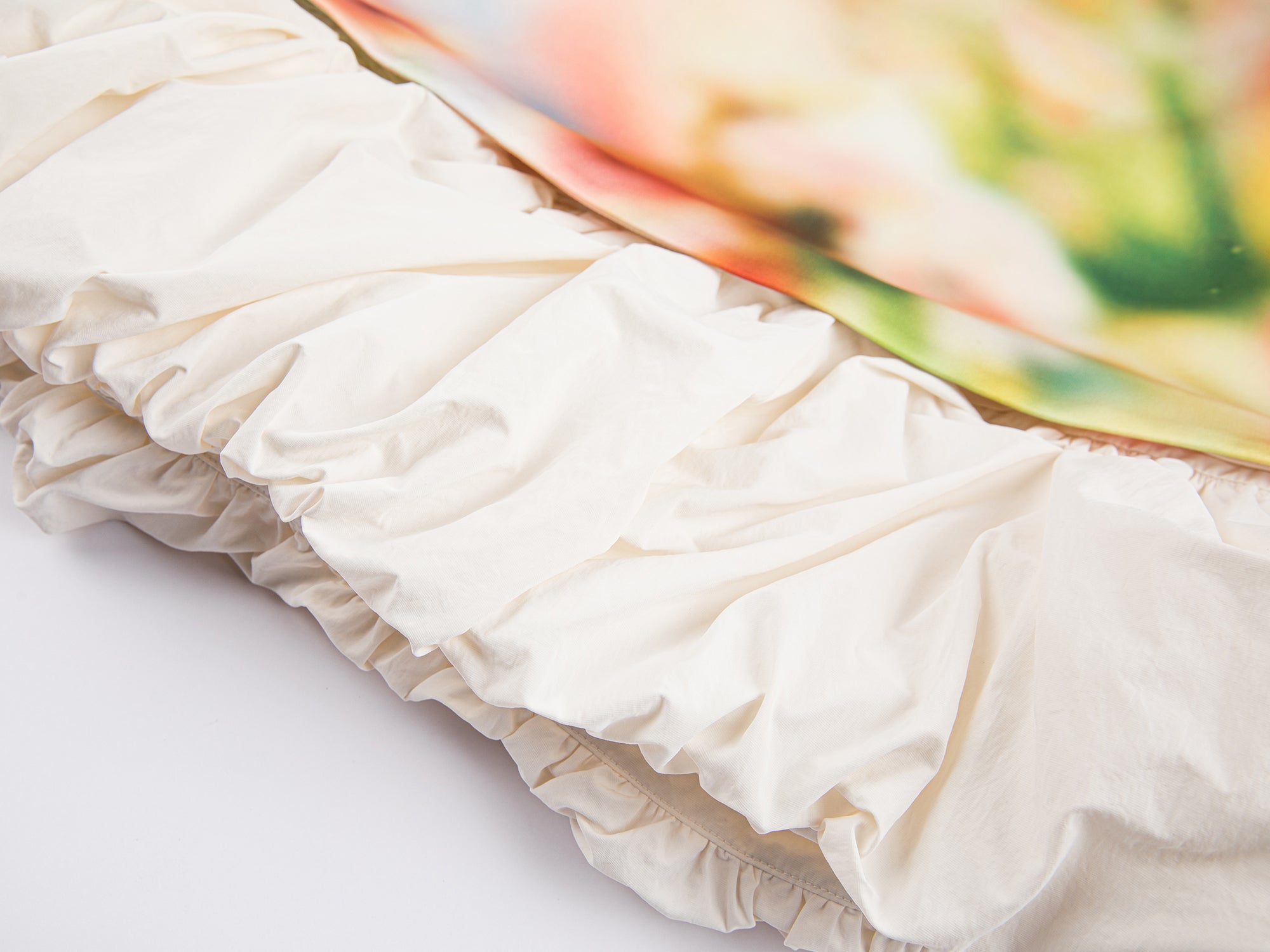 Blurred pastel pattern white bubble edge dress