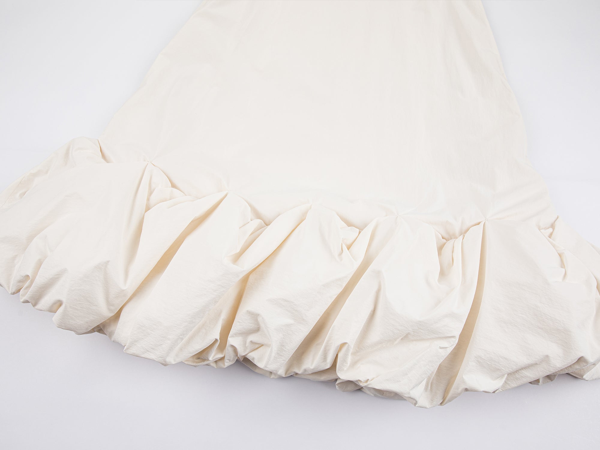 A-line sleeveless white bubble edge dress