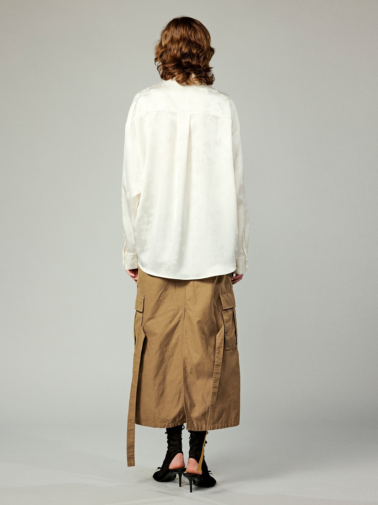 Modern chinese-style embroidered button shirt with tie hem detail