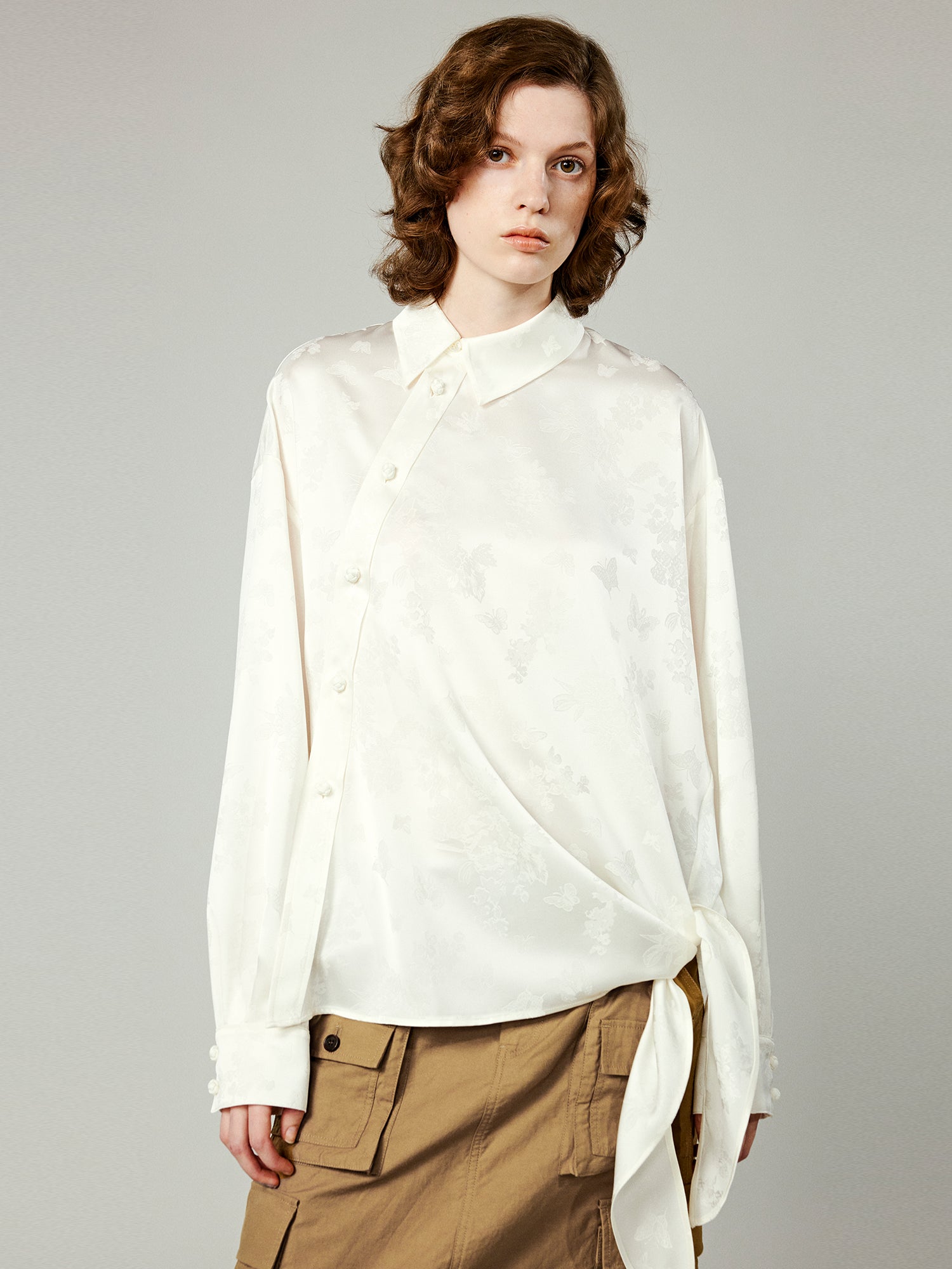 Modern chinese-style embroidered button shirt with tie hem detail