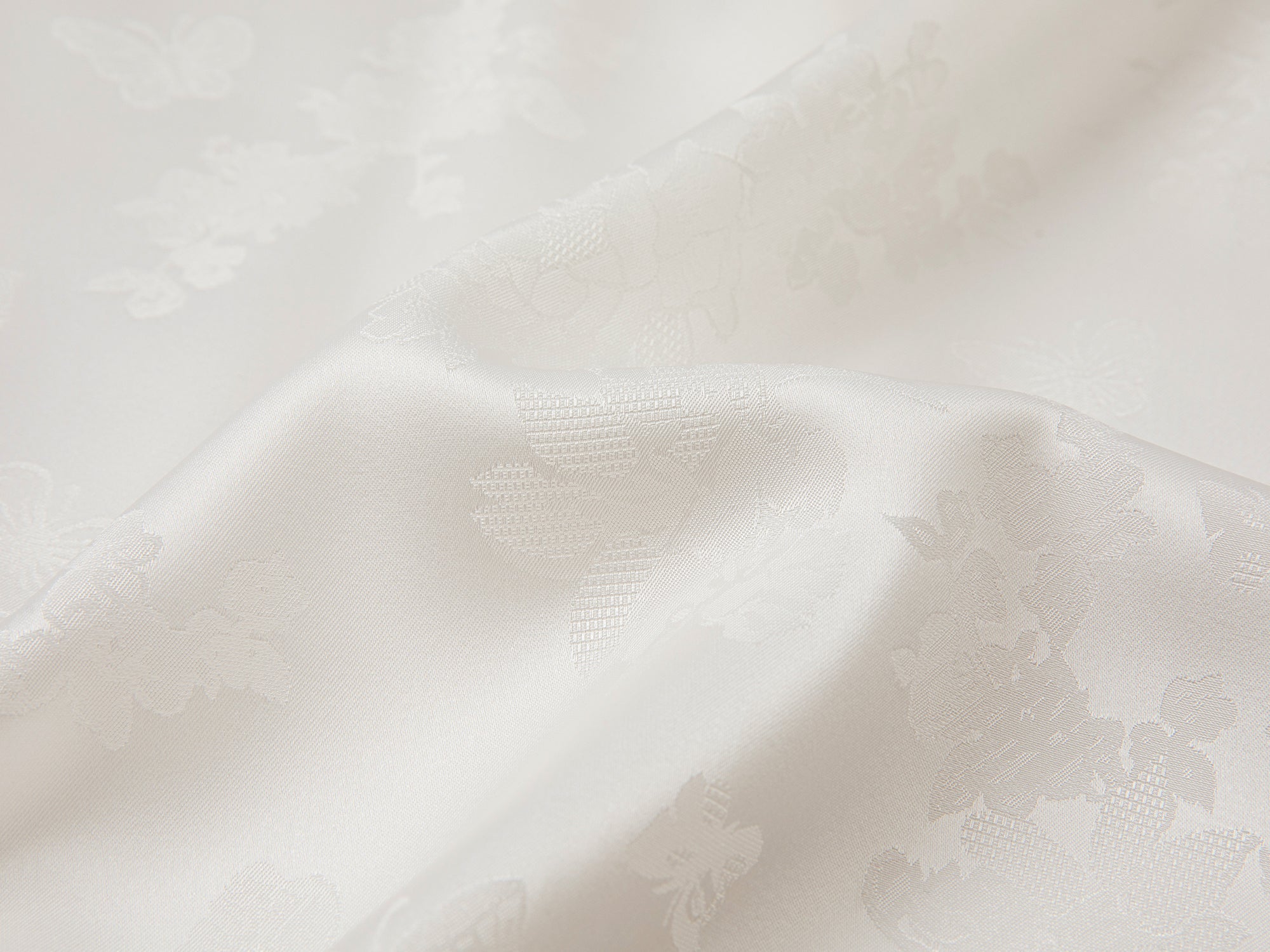 Modern chinese-style embroidered button shirt with tie hem detail