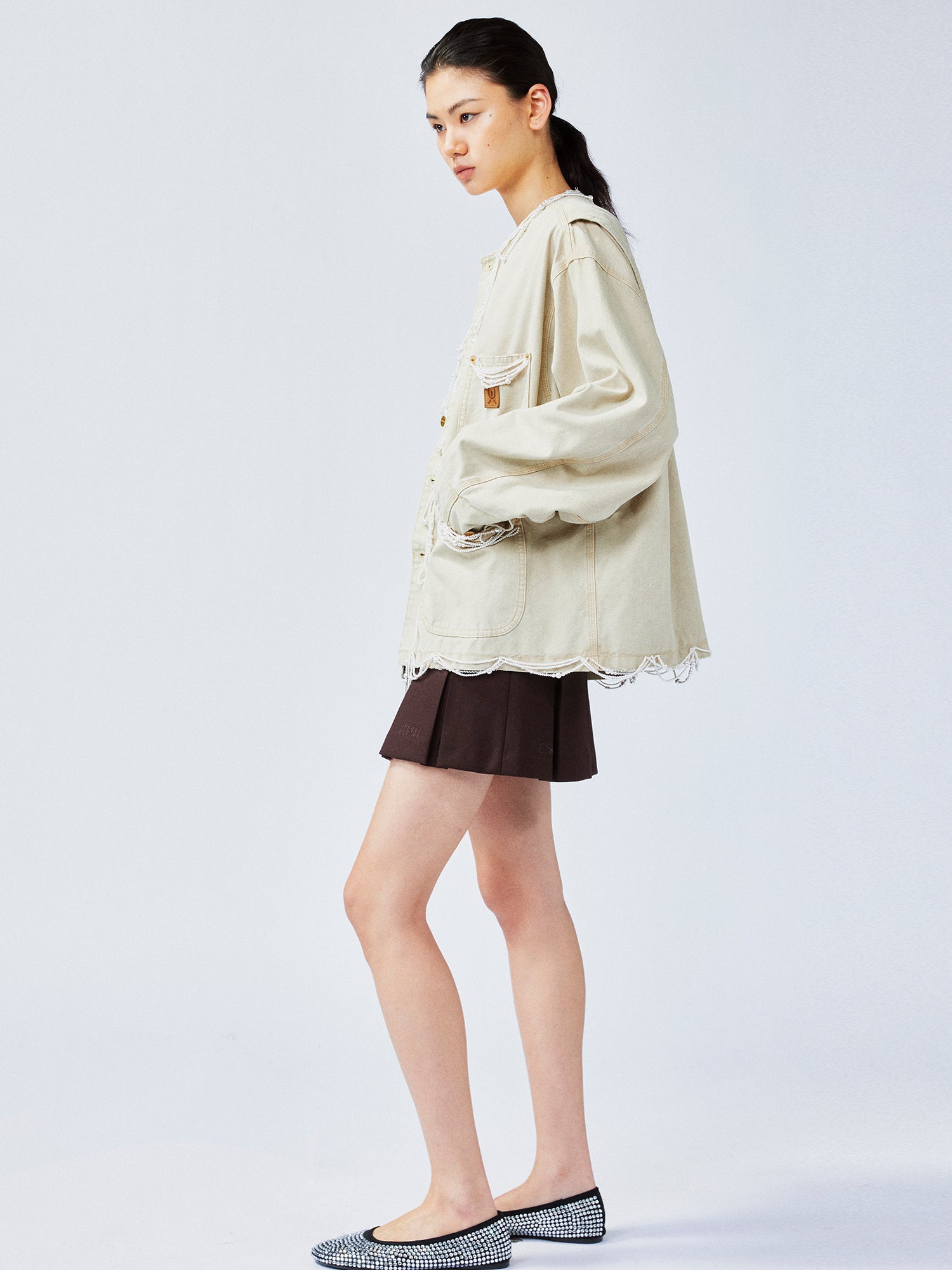 Elegant and lively pearl chain Michigan jacket