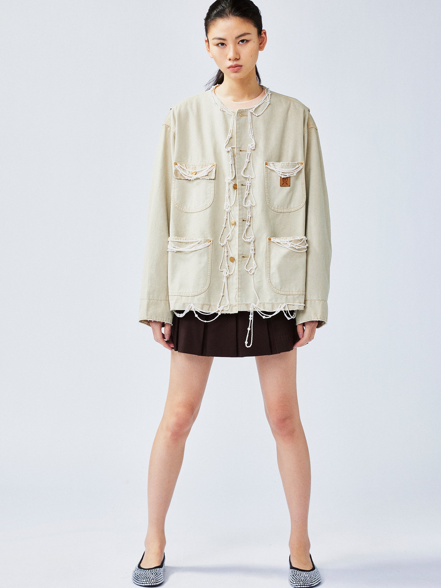 Elegant and lively pearl chain Michigan jacket