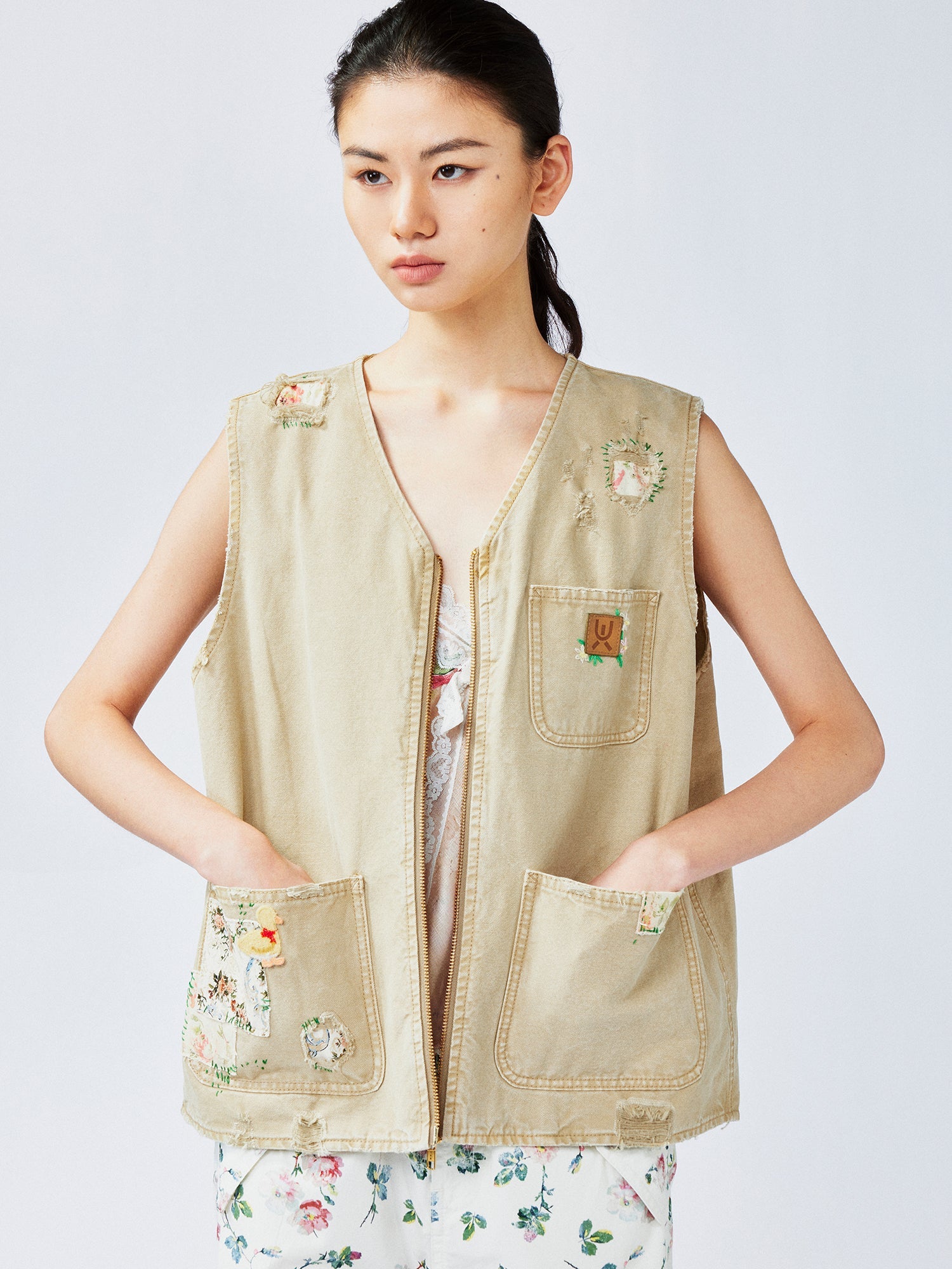 Nostalgic workwear vest with playful patchwork