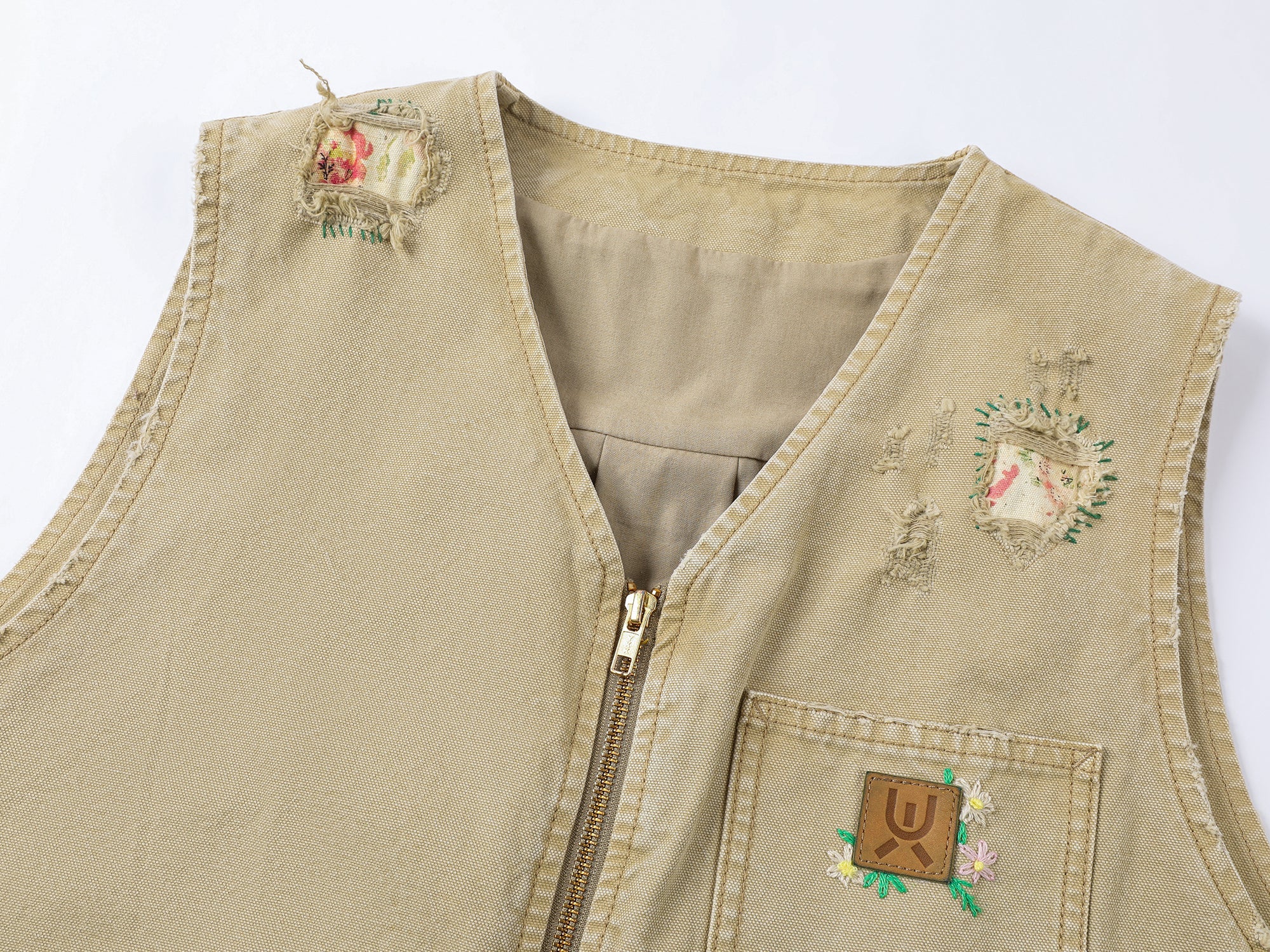 Nostalgic workwear vest with playful patchwork