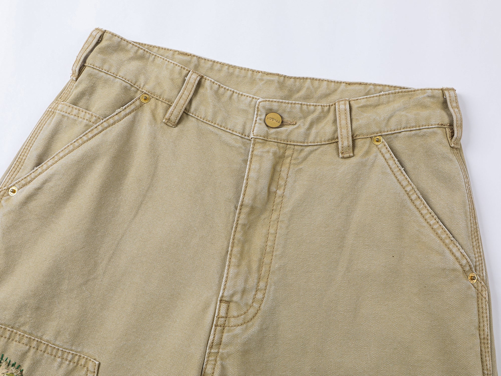 Nostalgic workwear pants with playful patchwork