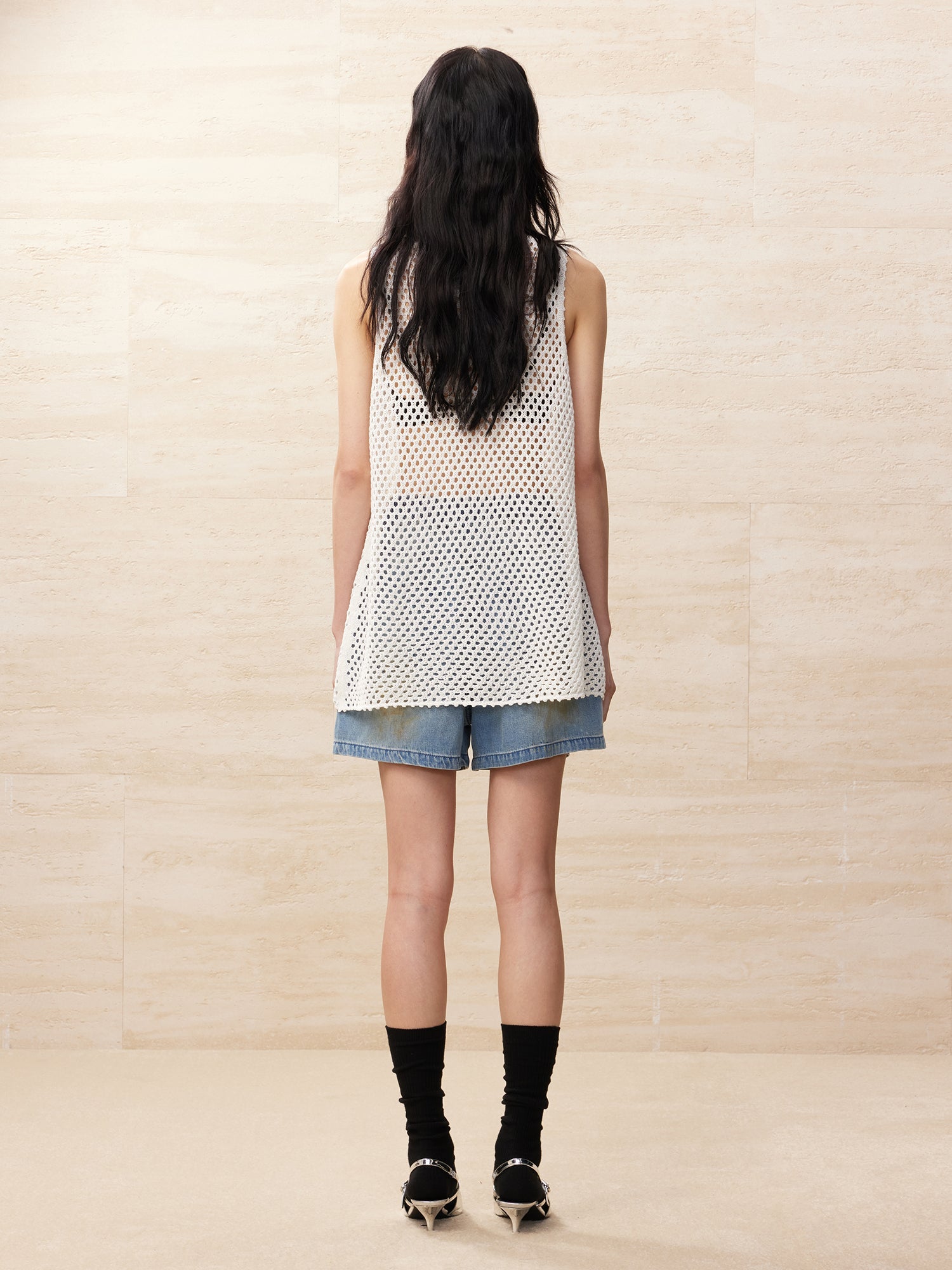 Oversized knitted crochet floral vest