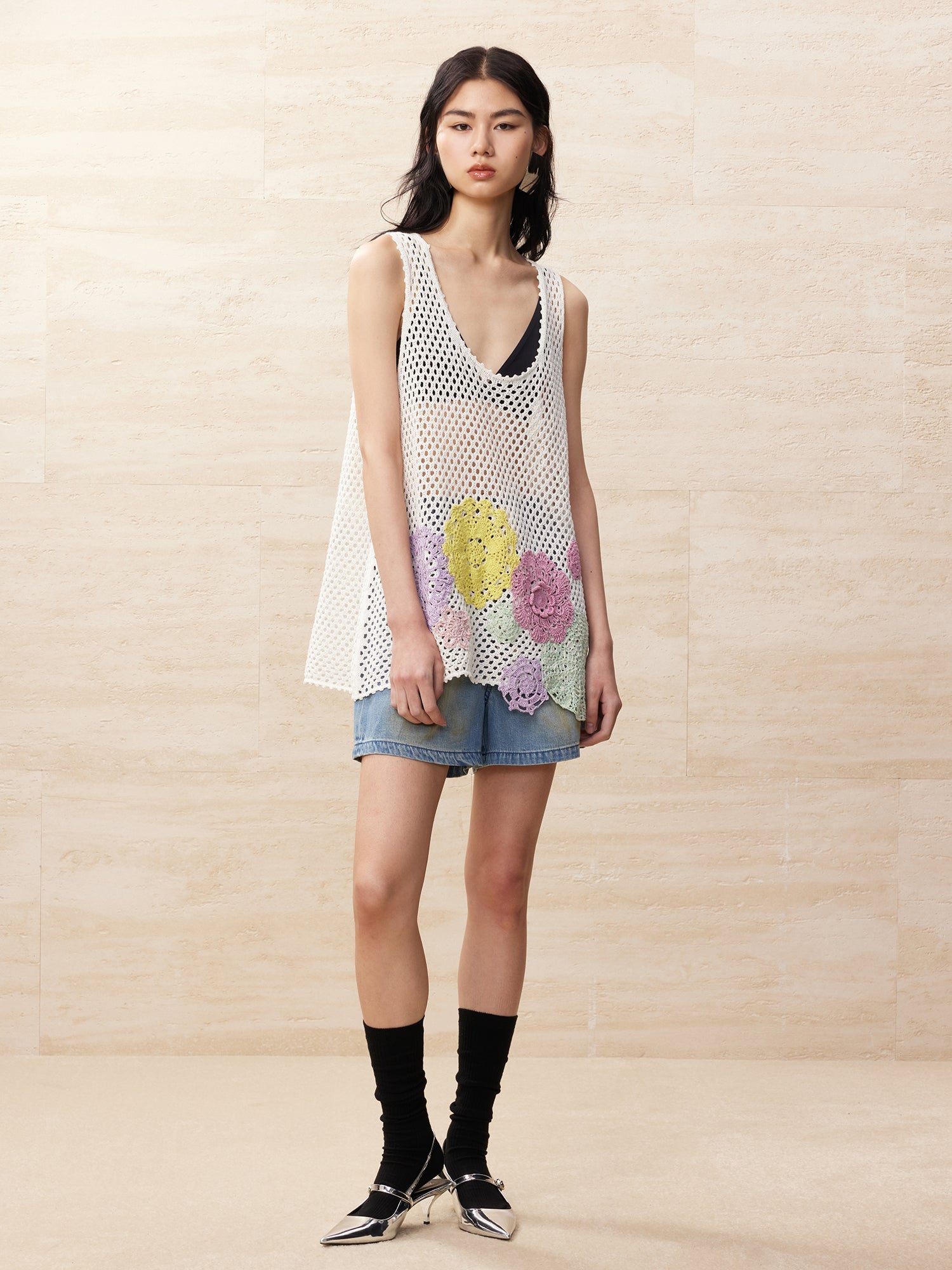 Oversized knitted crochet floral vest