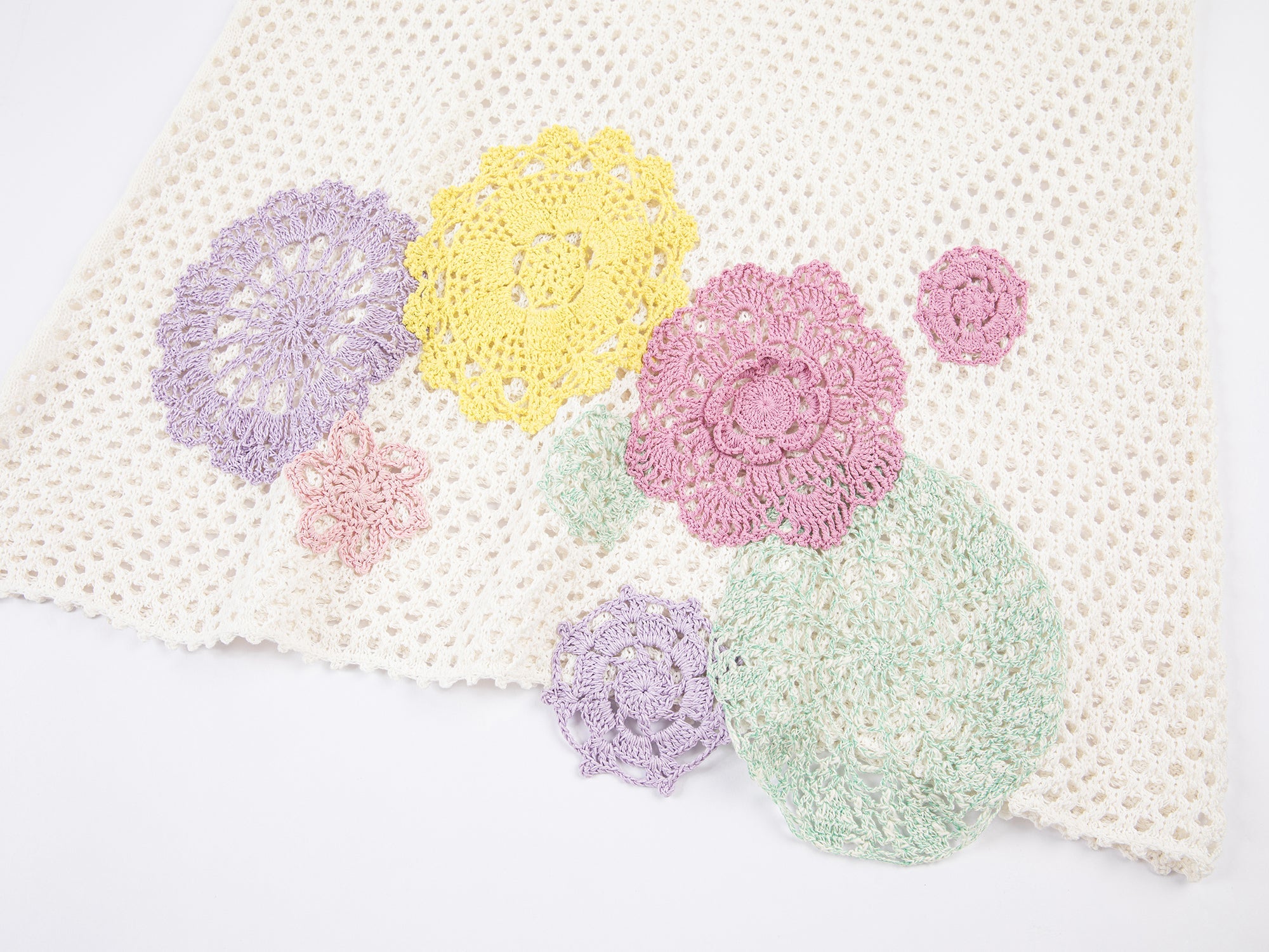 Oversized knitted crochet floral vest