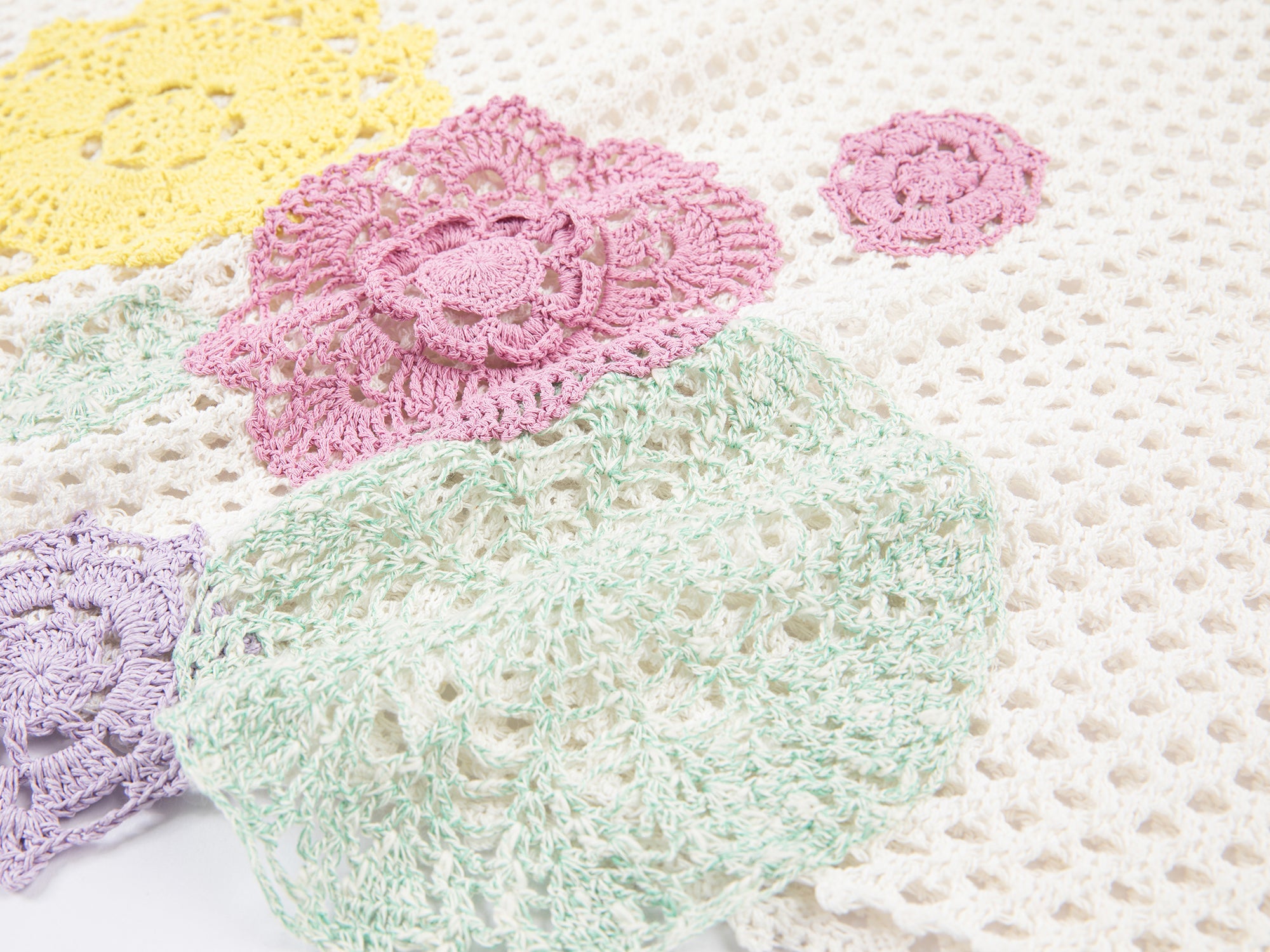 Oversized knitted crochet floral vest