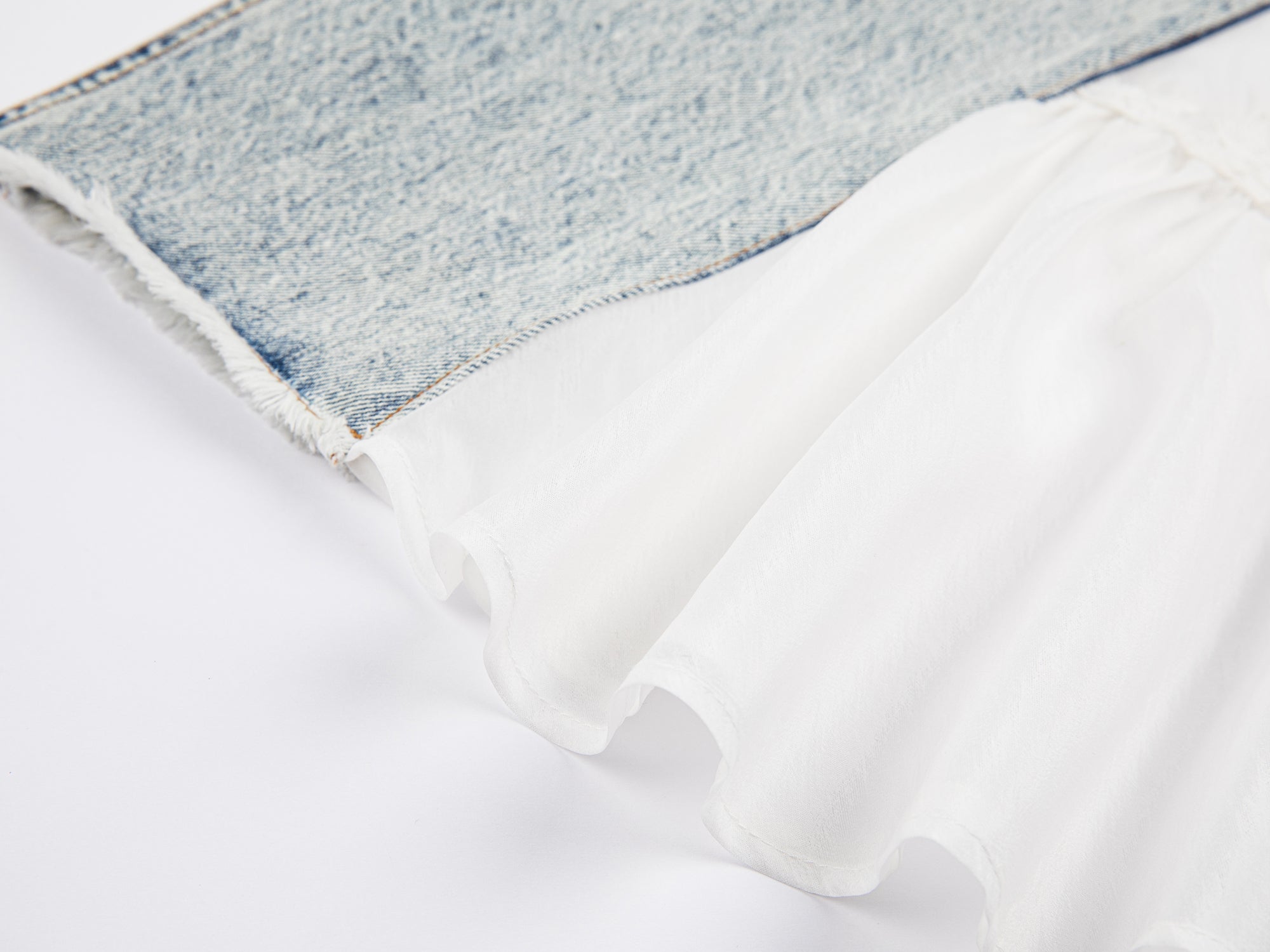 Deconstructed washed denim skirt