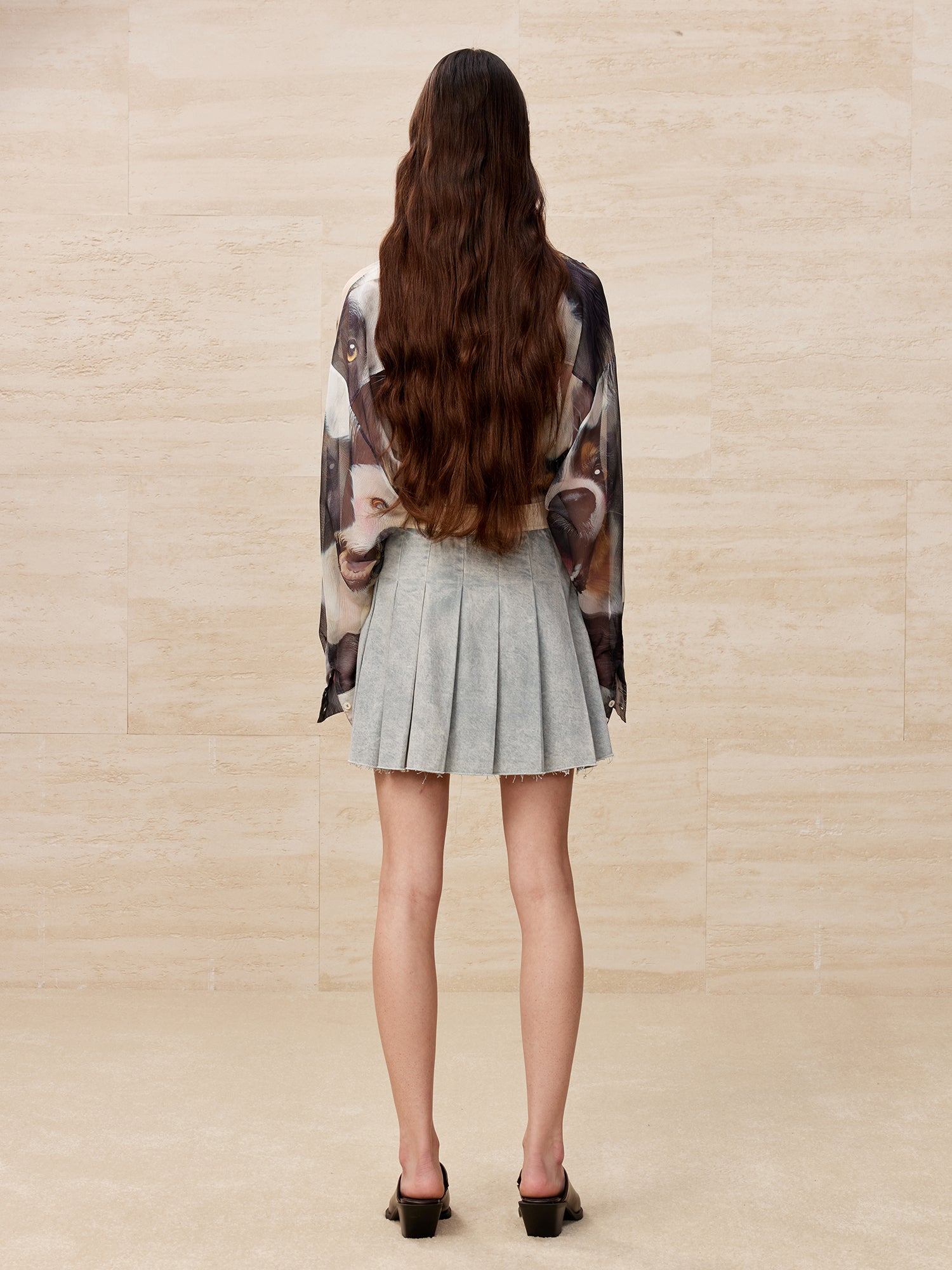 Raw edge pleated washed denim skirt