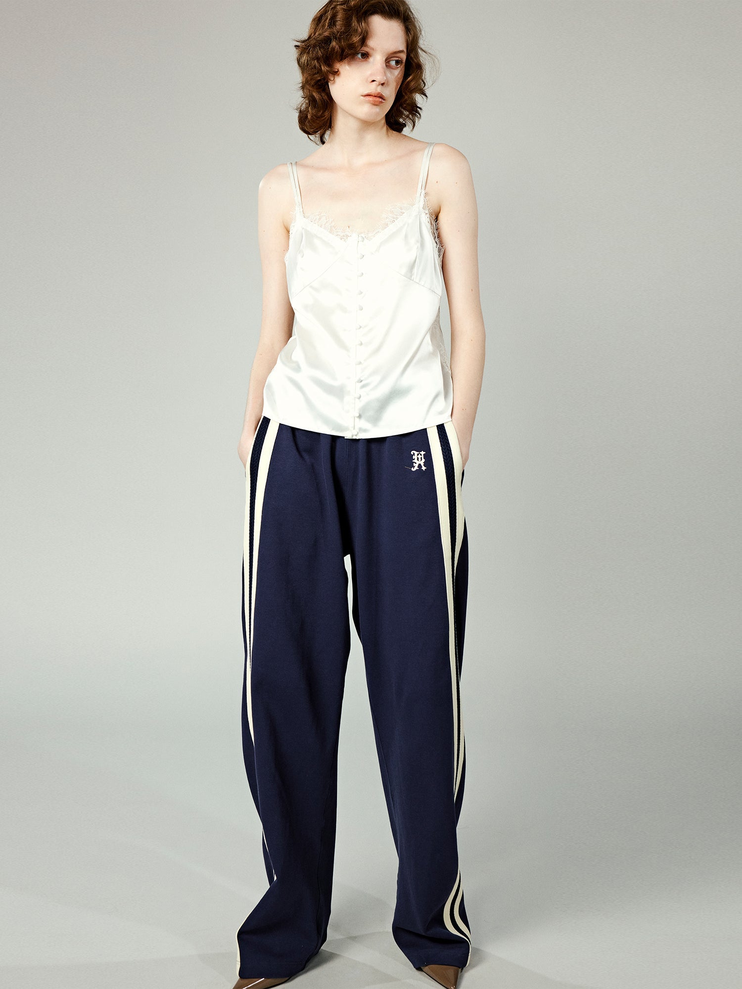 Lace-trimmed cami top in white