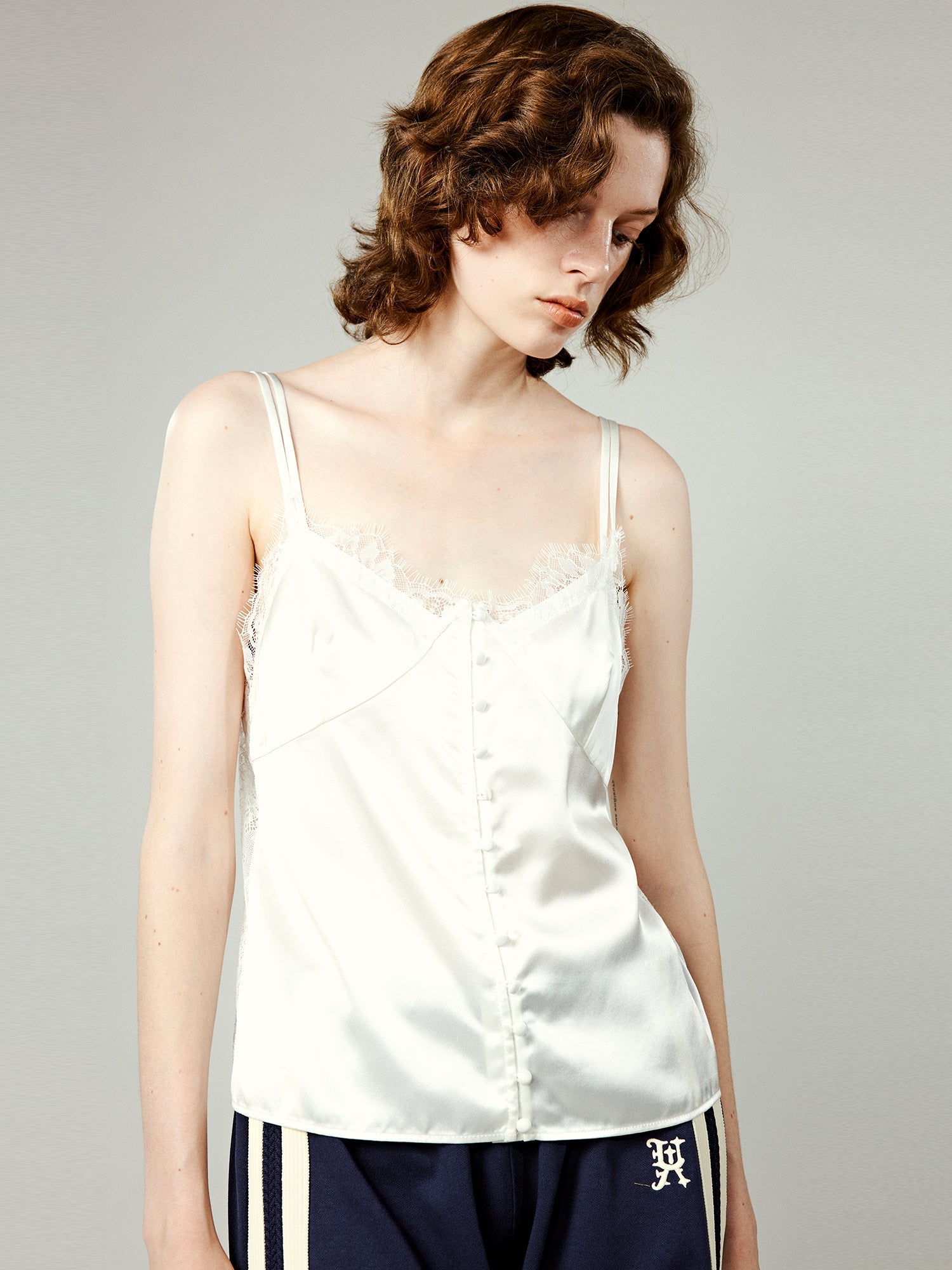 Lace-trimmed cami top in white