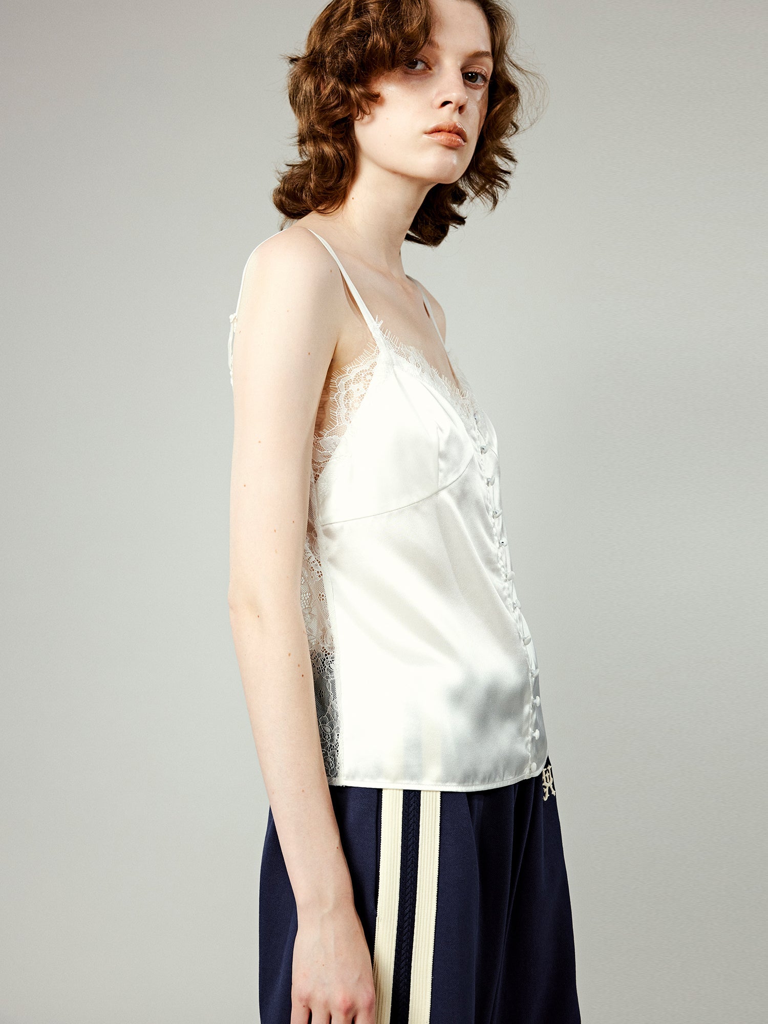 Lace-trimmed cami top in white