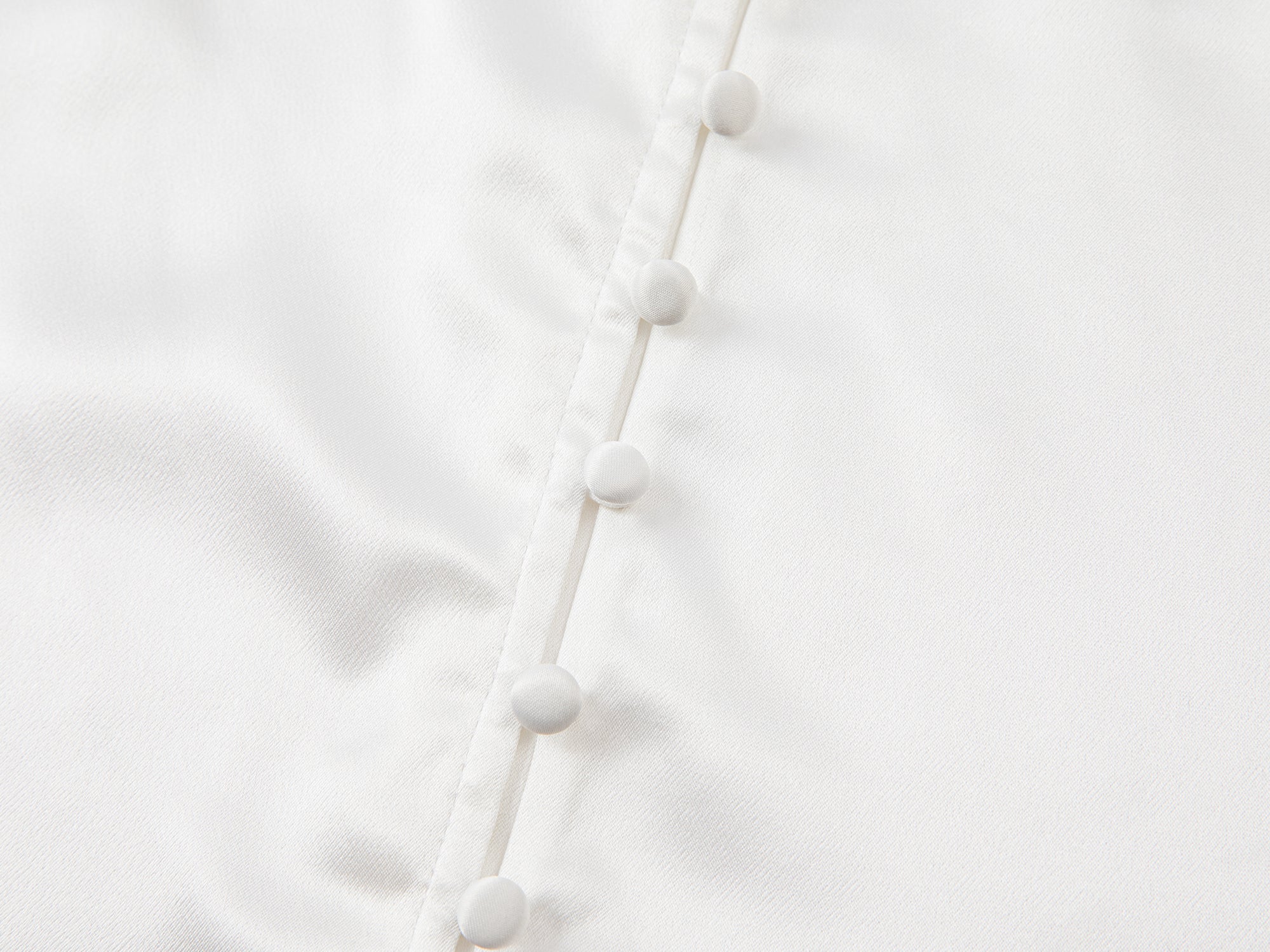 Lace-trimmed cami top in white