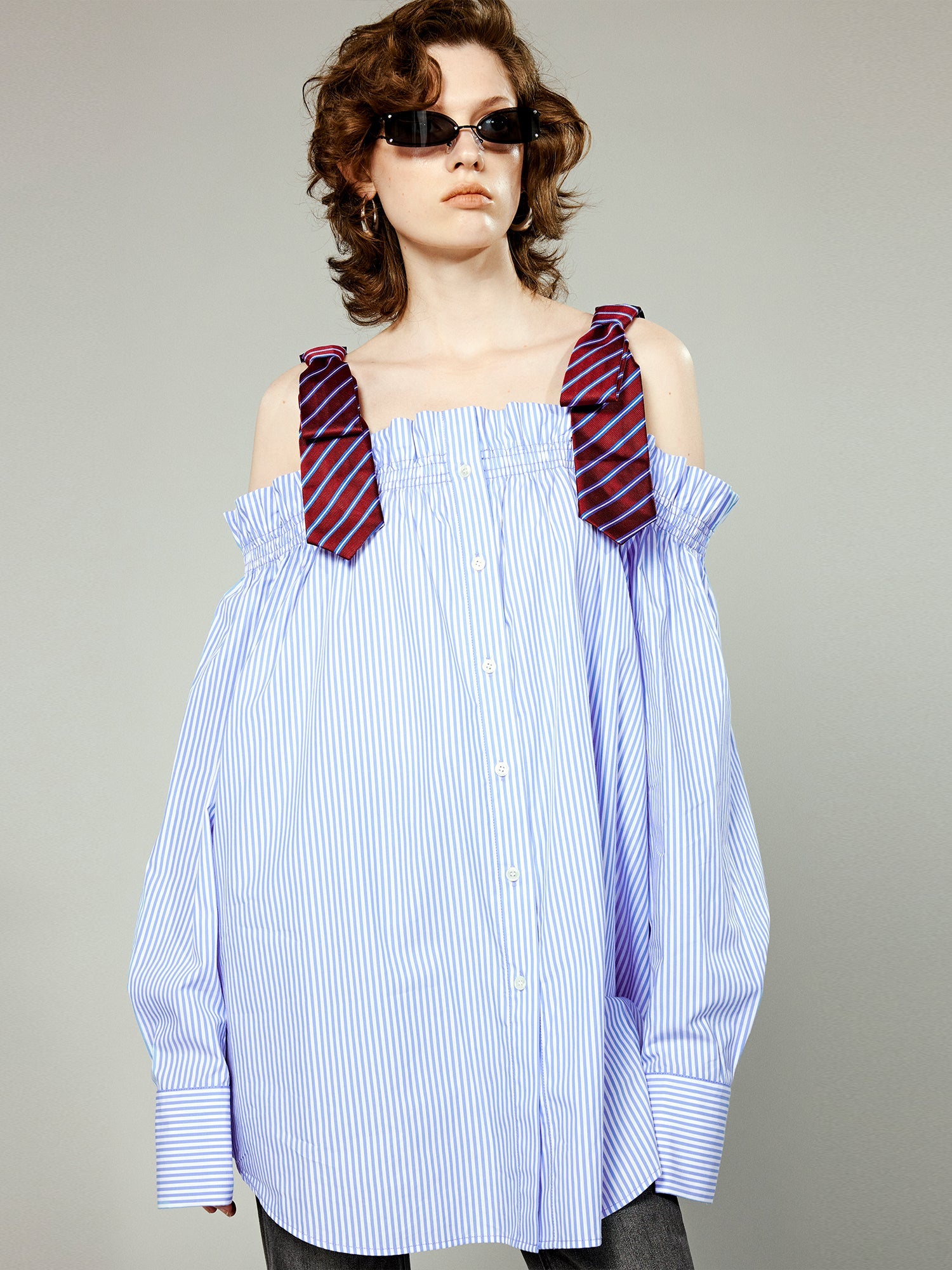 Pinstriped off-shoulder top with mens bow-tie straps