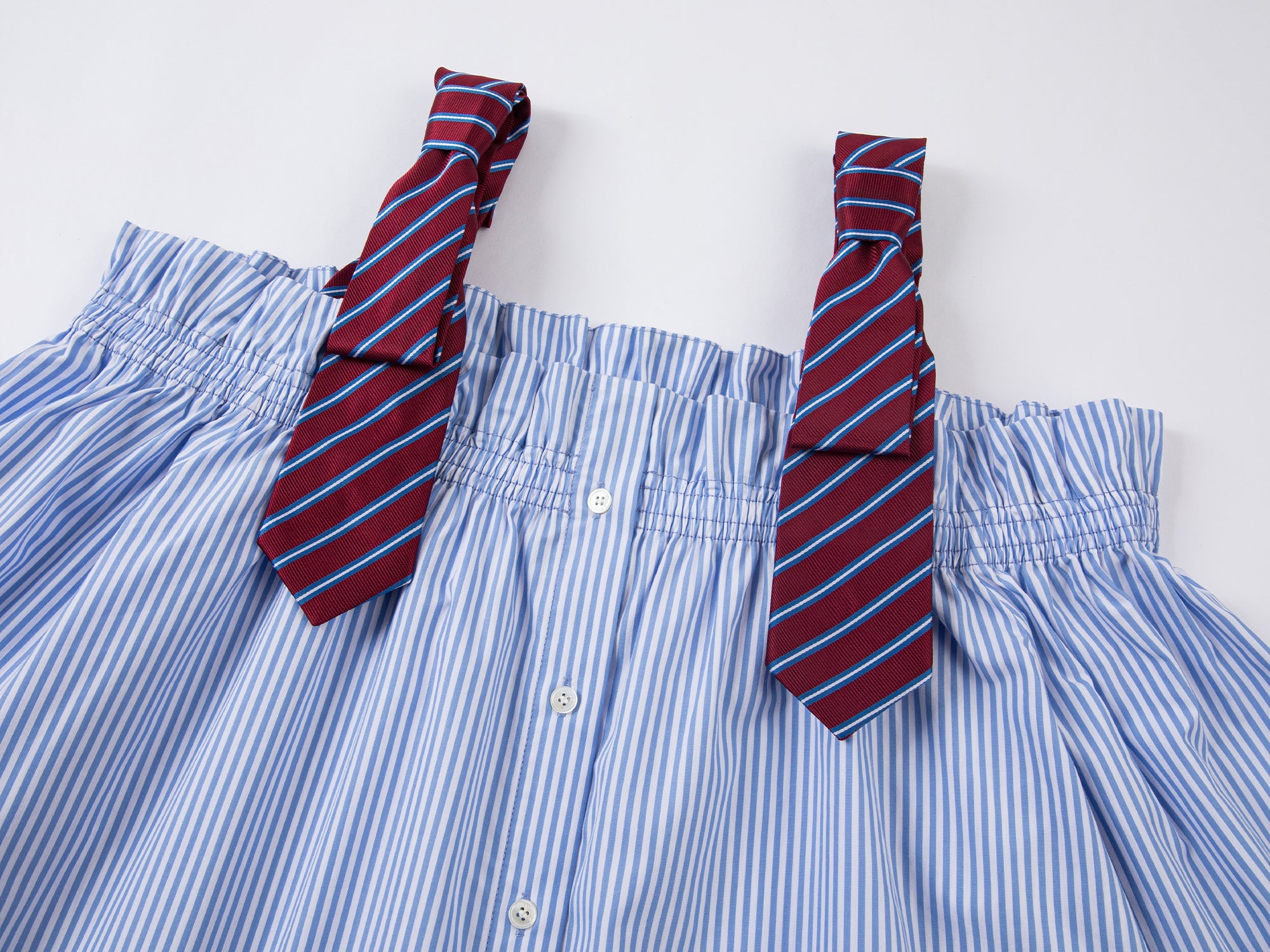 Pinstriped off-shoulder top with mens bow-tie straps