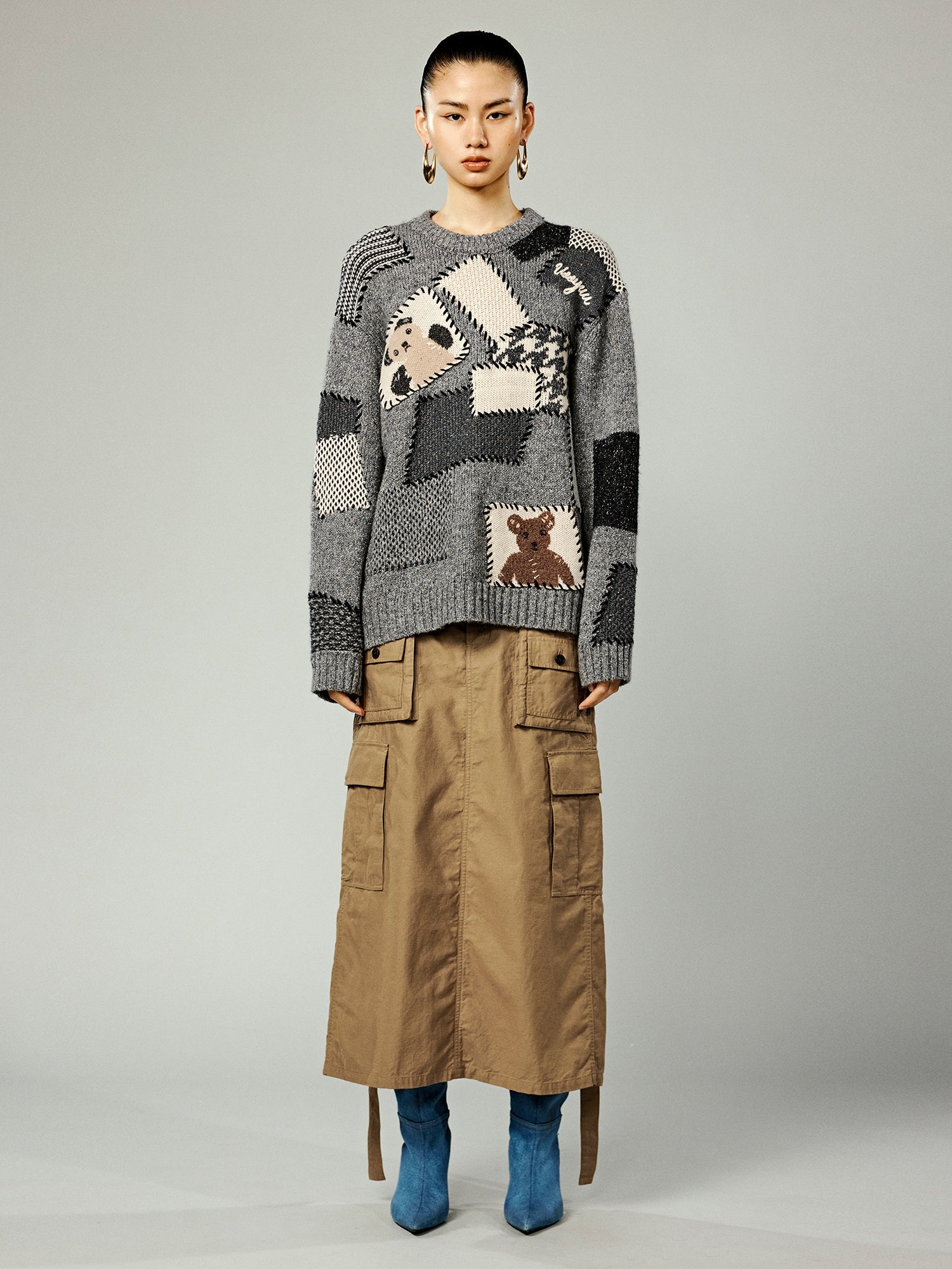 Vintage-inspired knit sweater with patches