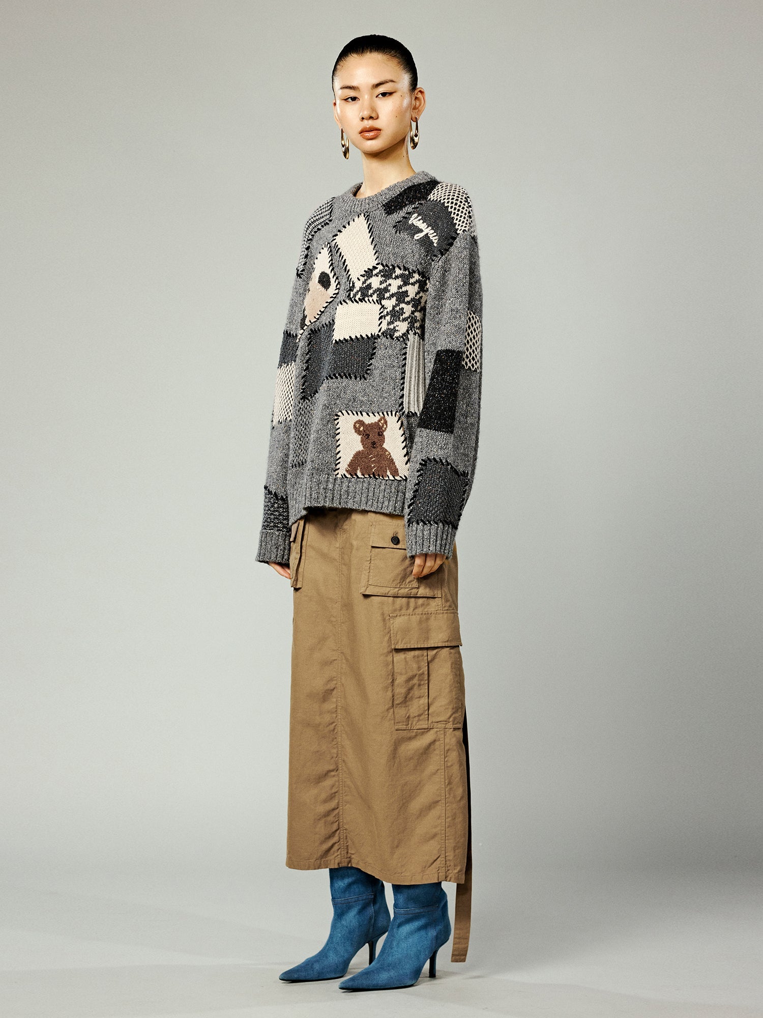 Vintage-inspired knit sweater with patches