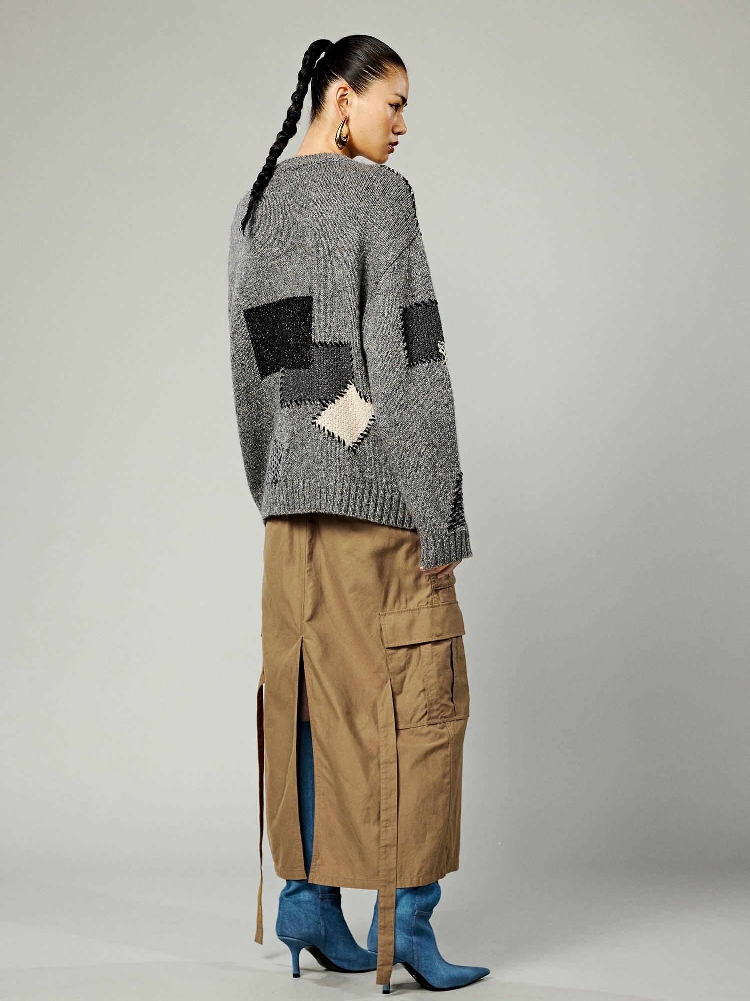 Vintage-inspired knit sweater with patches