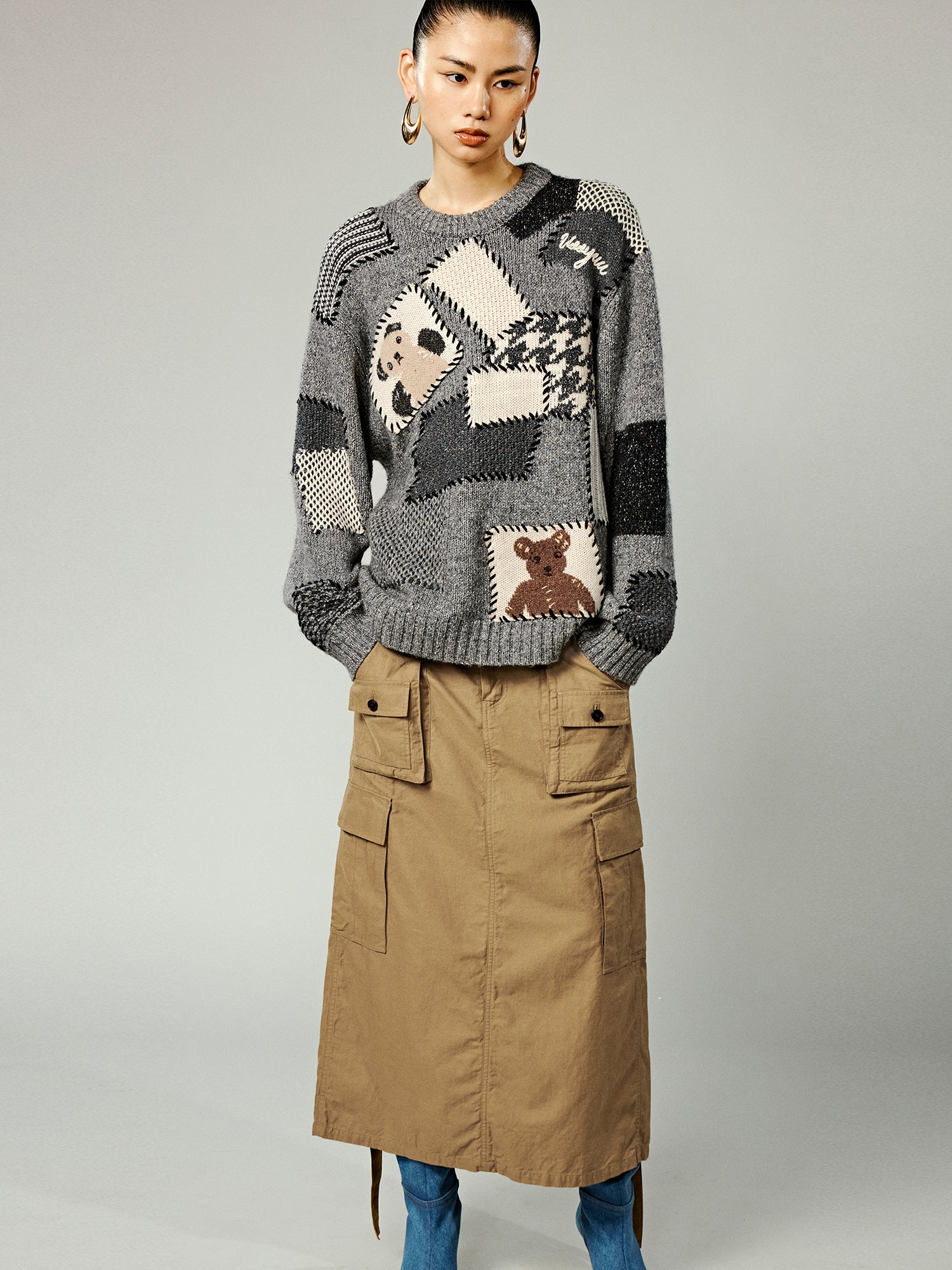 Vintage-inspired knit sweater with patches