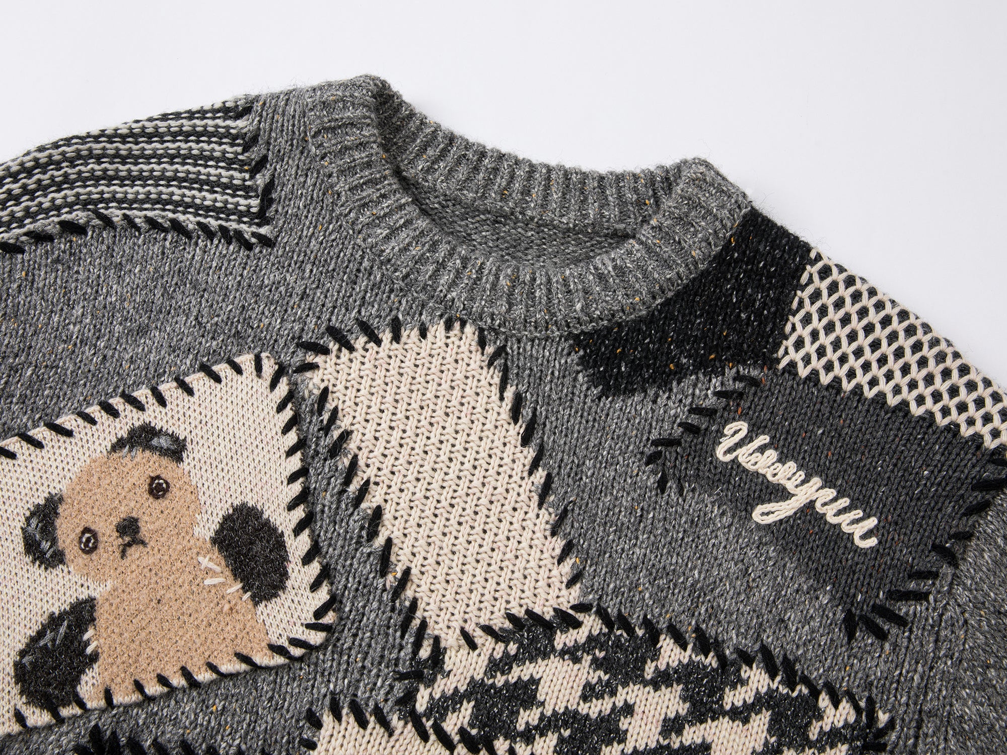 Vintage-inspired knit sweater with patches