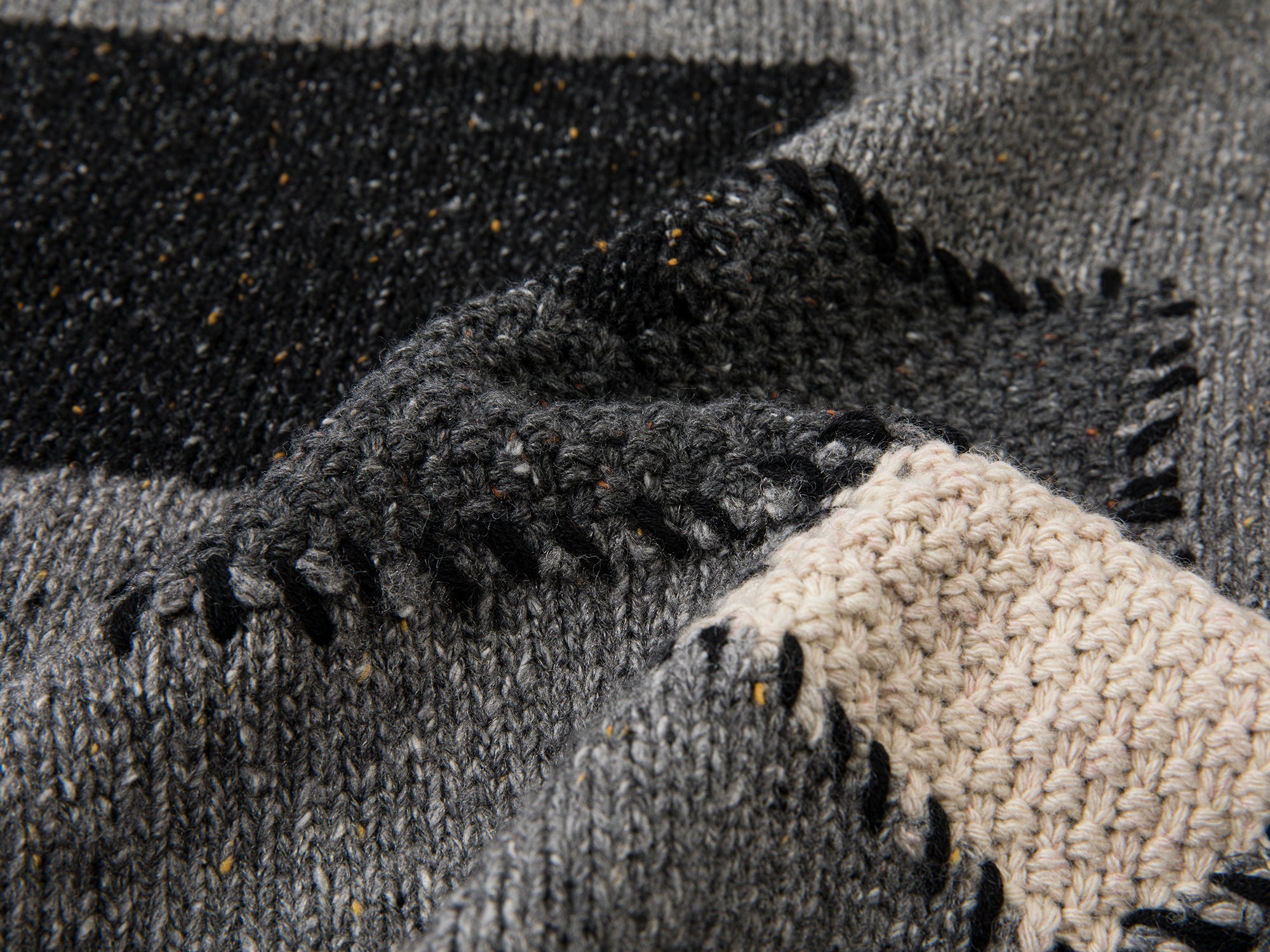 Vintage-inspired knit sweater with patches