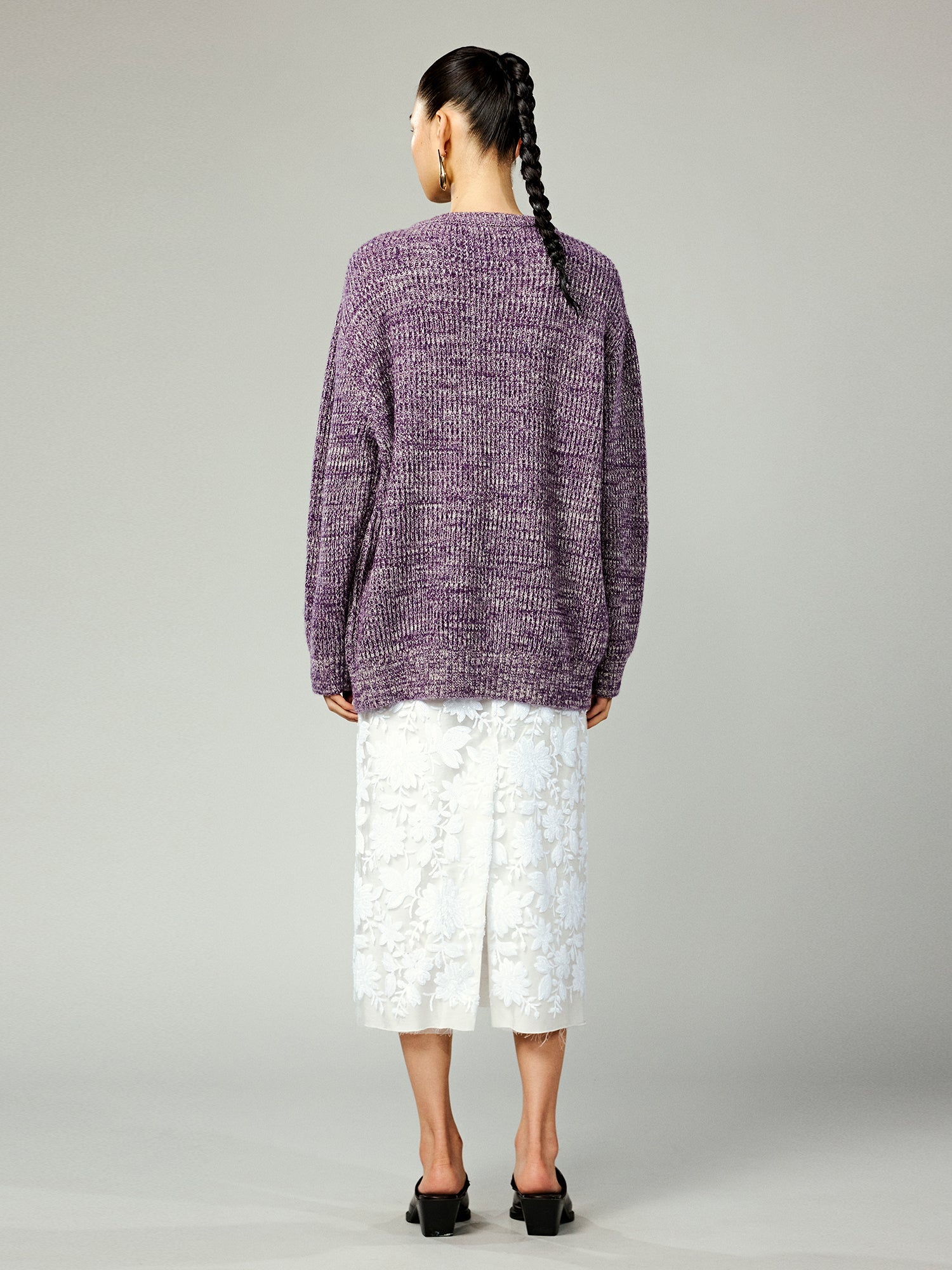 Vintage-inspired knit sweater with patches