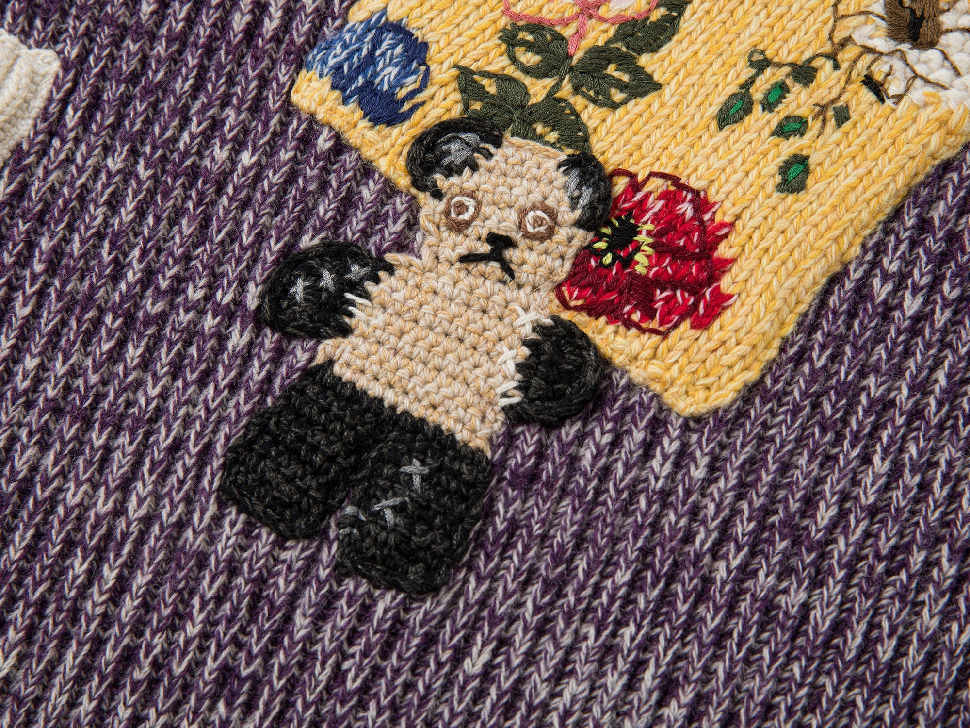 Vintage-inspired knit sweater with patches