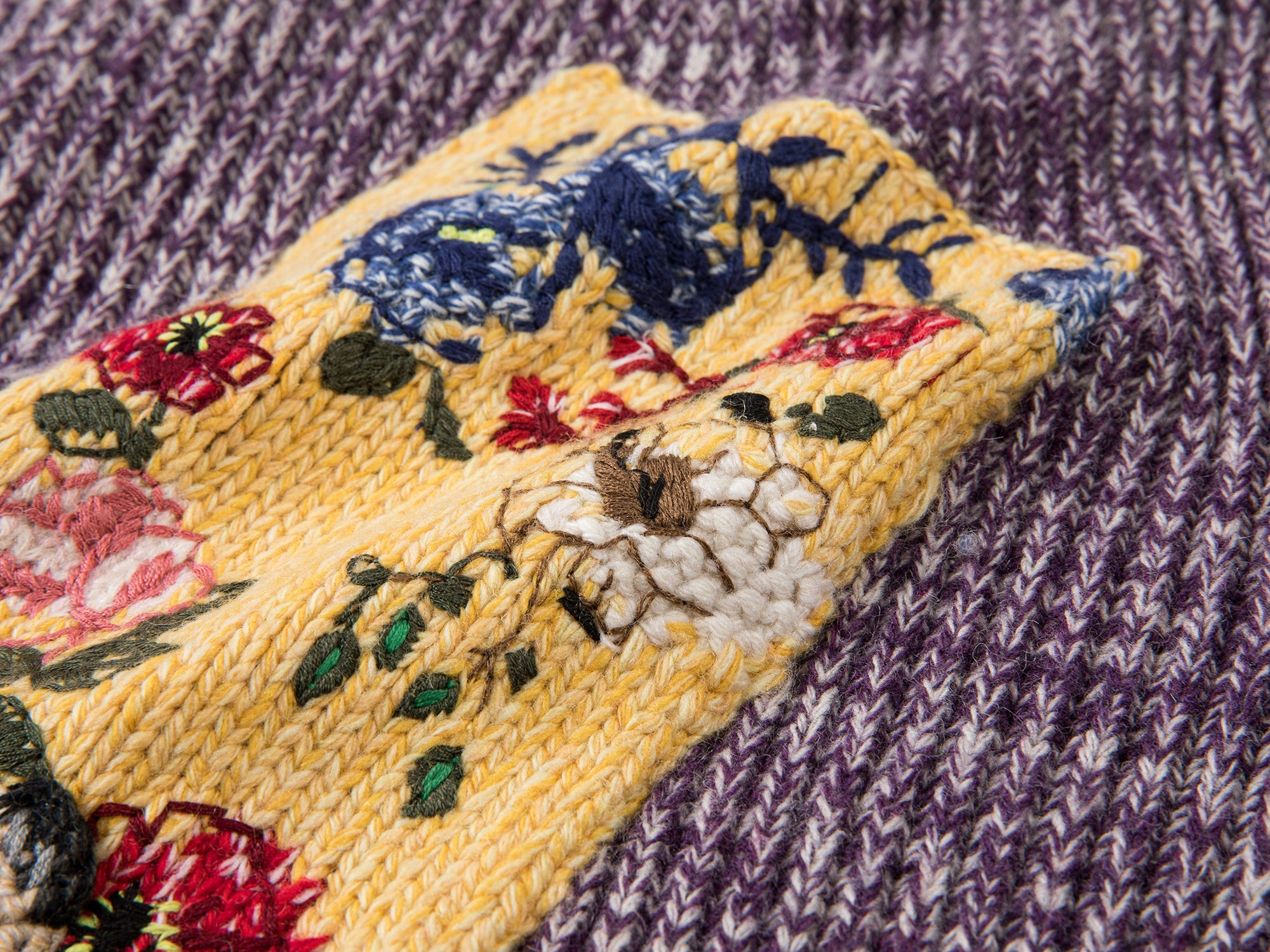 Vintage-inspired knit sweater with patches