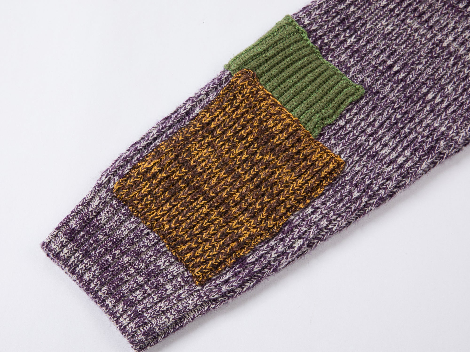 Vintage-inspired knit sweater with patches