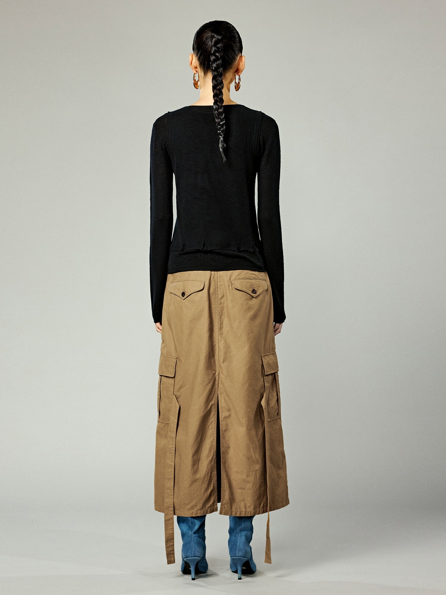 Distressed faux-layered bow sweater