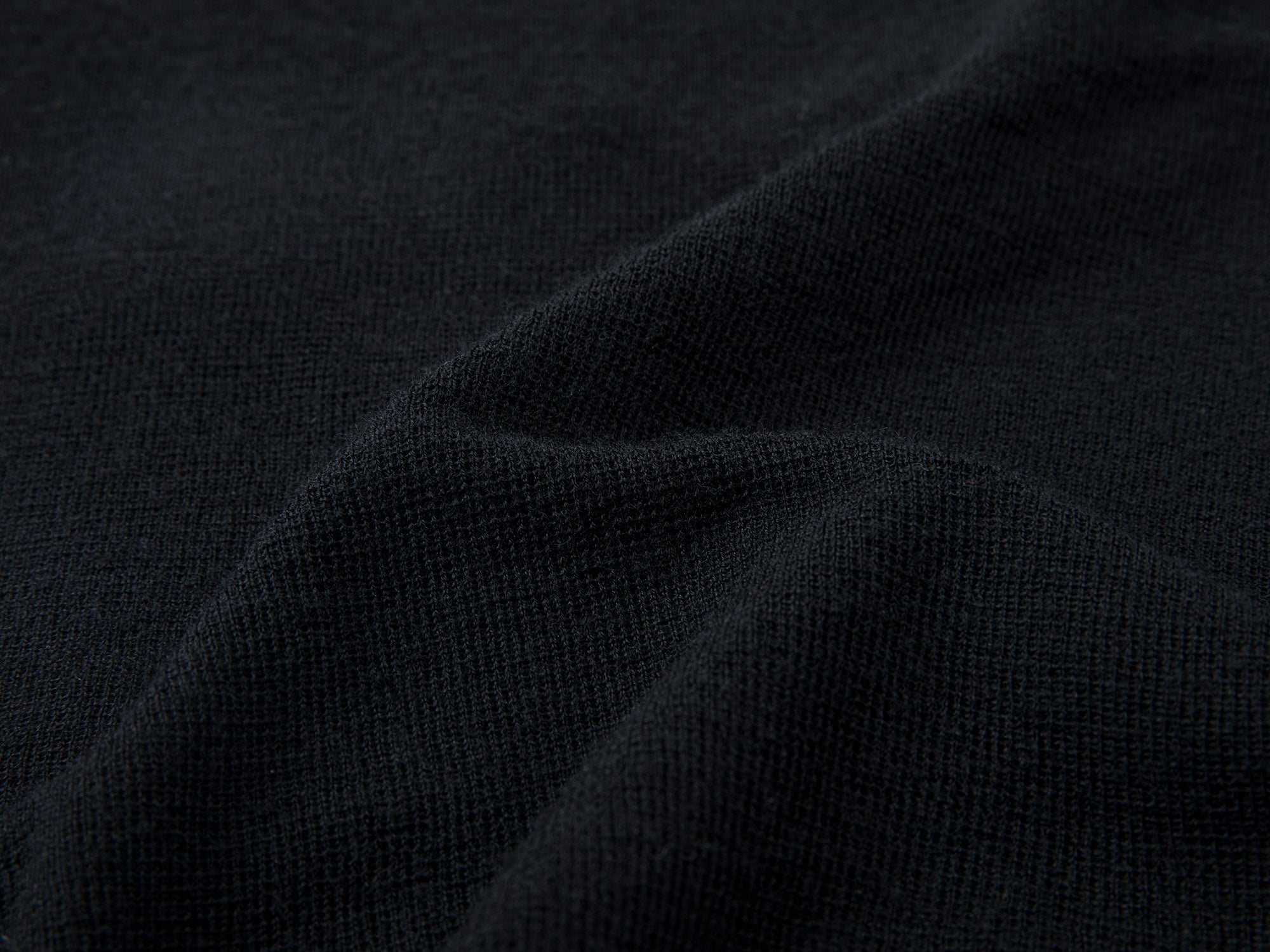 Distressed faux-layered bow sweater