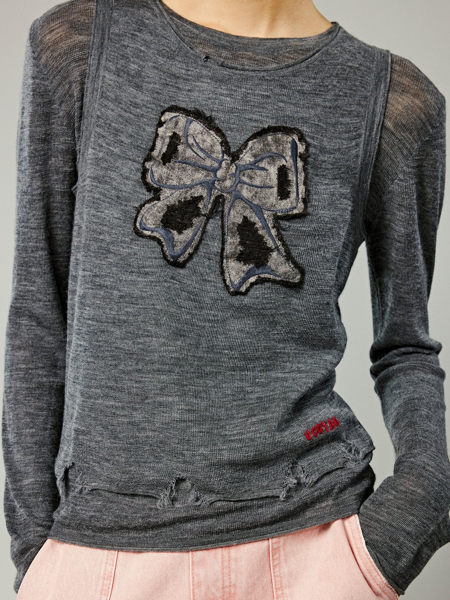 Faux-layered washed pullover sweater with bow detail