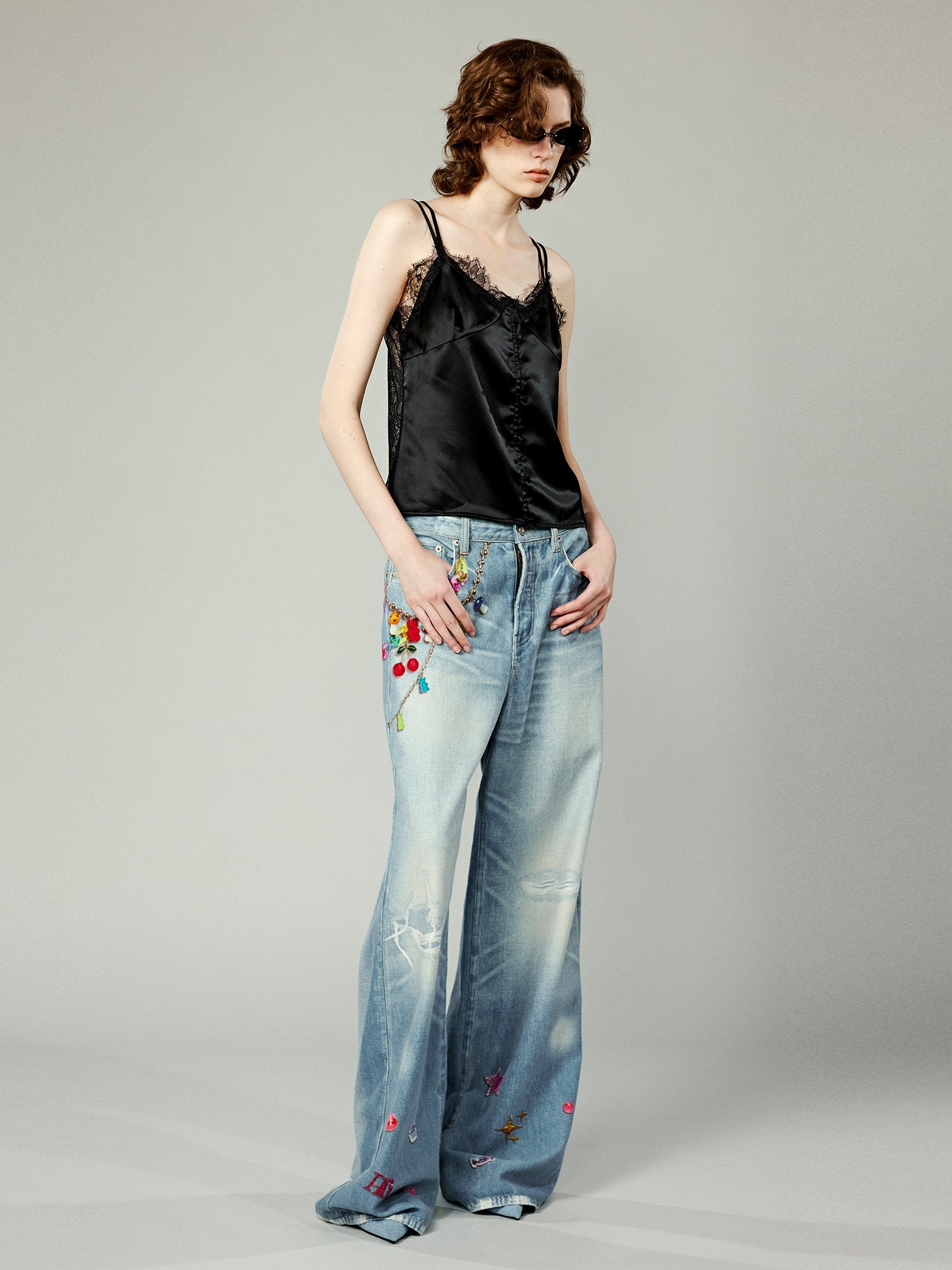 Trompe l'oeil chain print jeans