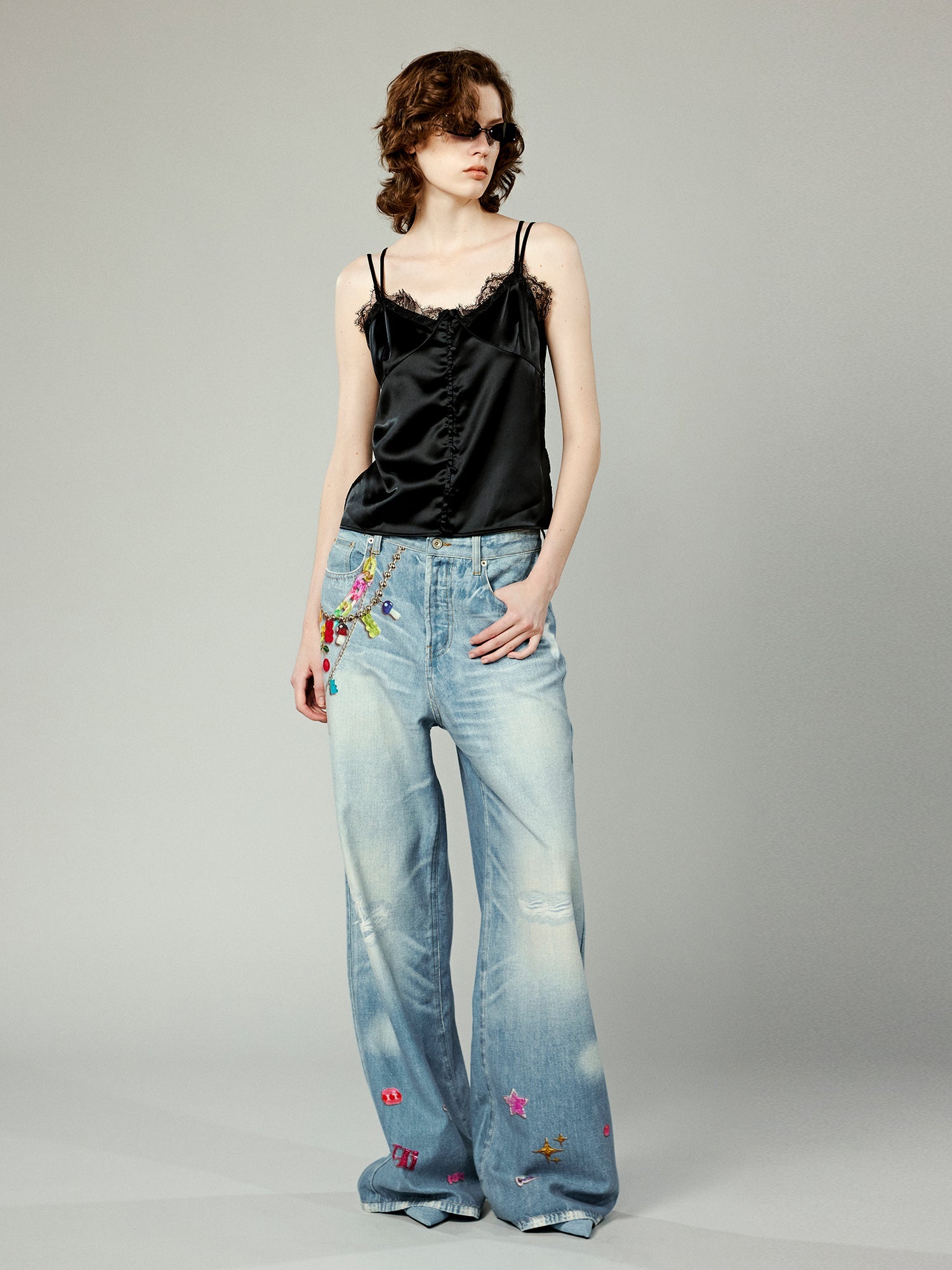 Trompe l'oeil chain print jeans