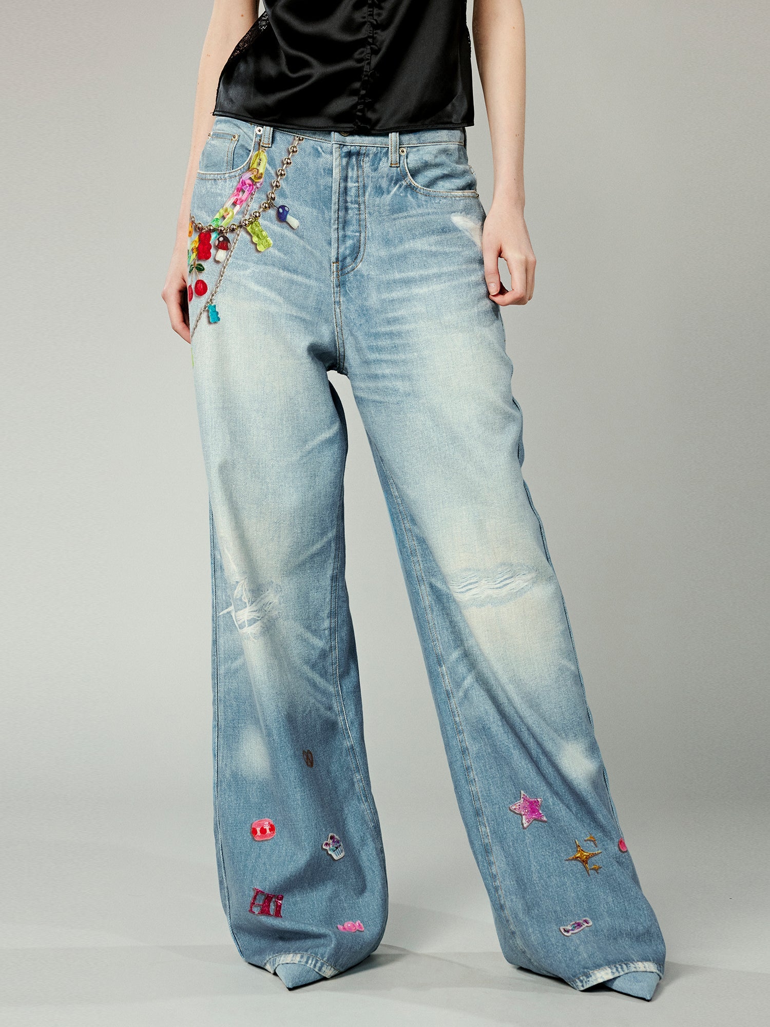 Trompe l'oeil chain print jeans