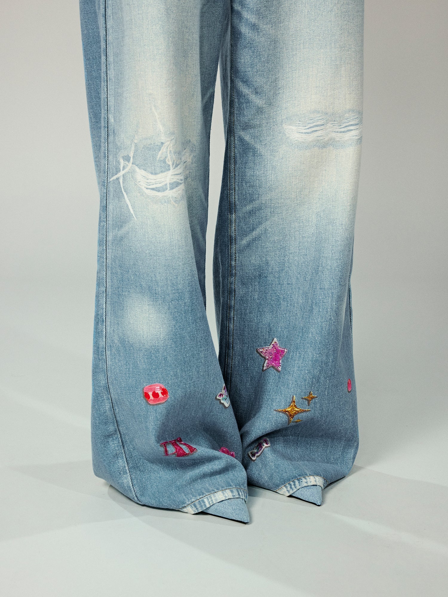 Trompe l'oeil chain print jeans