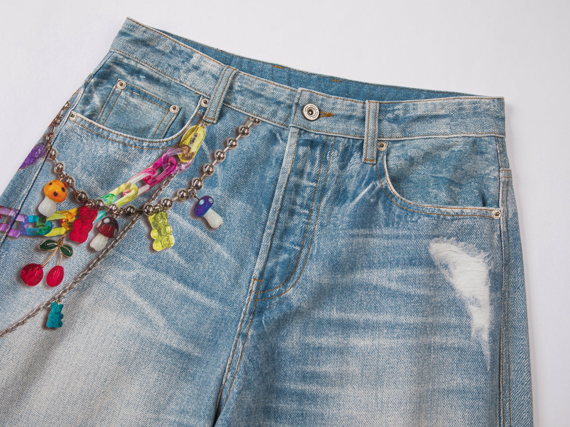 Trompe l'oeil chain print jeans