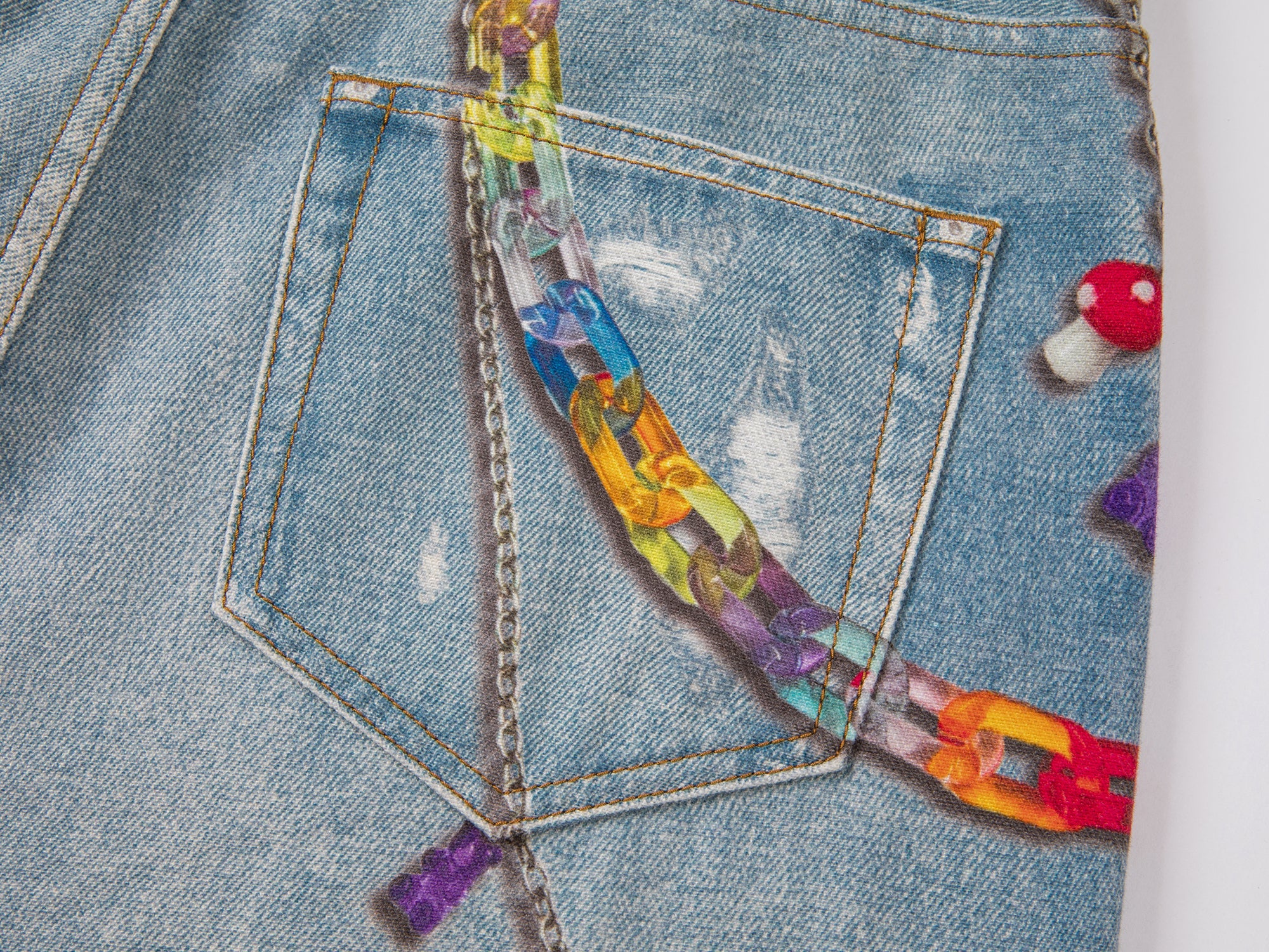 Trompe l'oeil chain print jeans