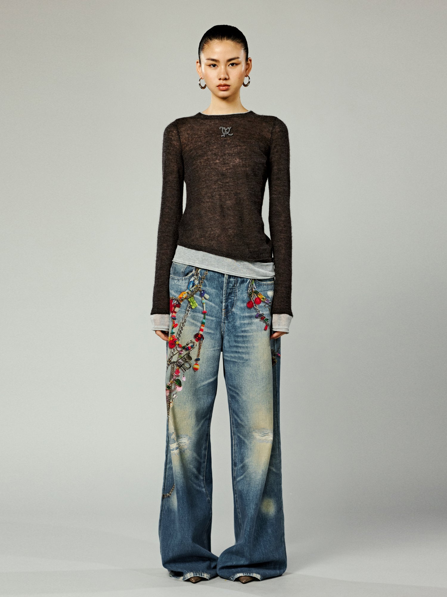 Trompe l'oeil chain print jeans