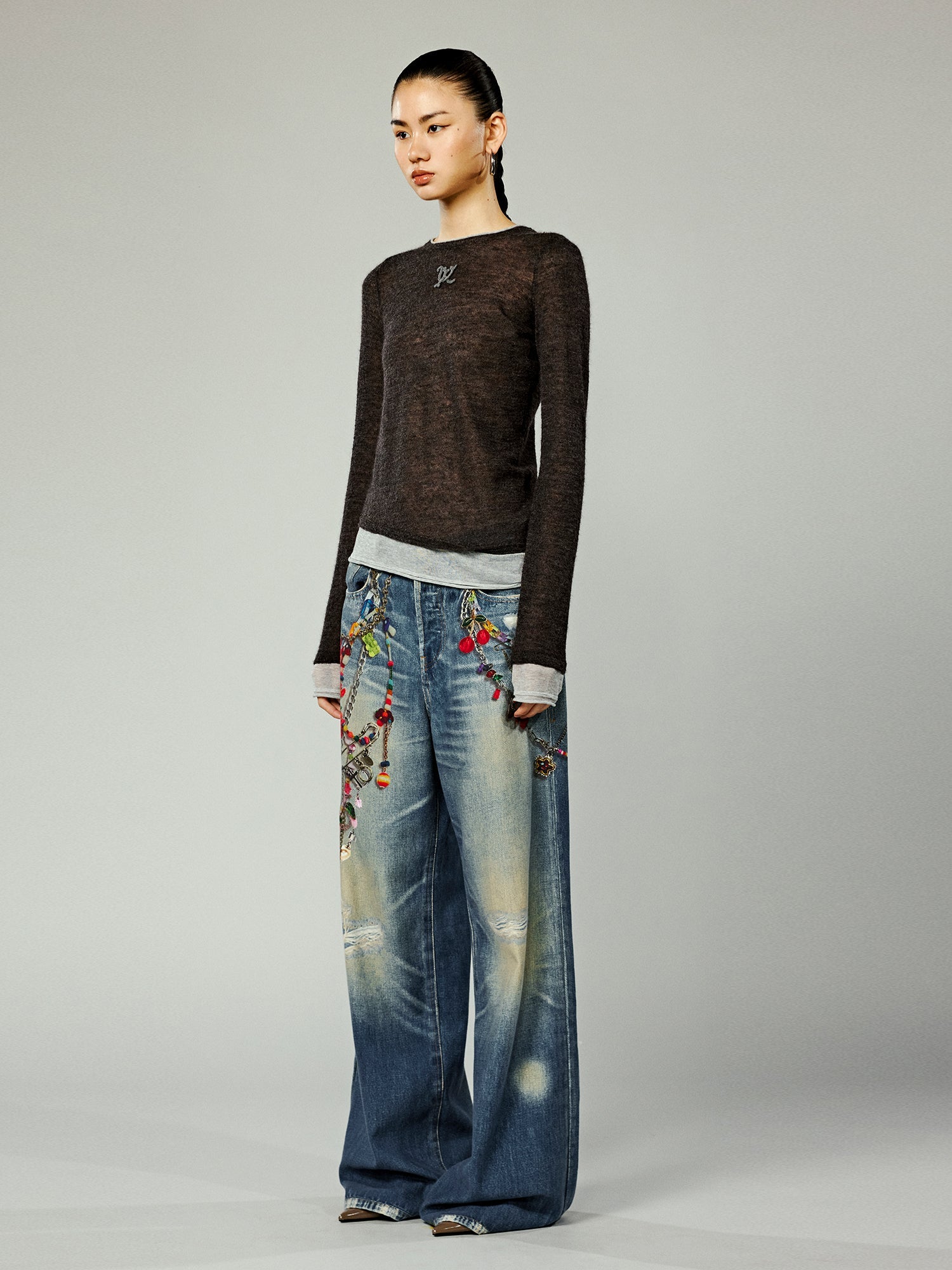 Trompe l'oeil chain print jeans