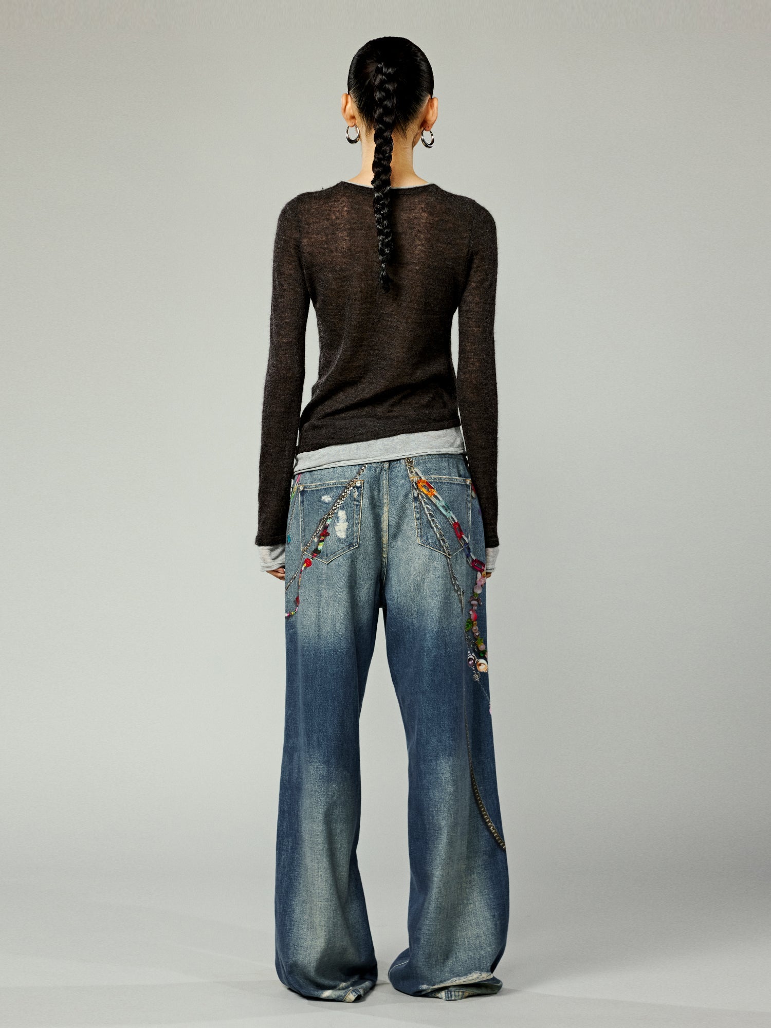 Trompe l'oeil chain print jeans