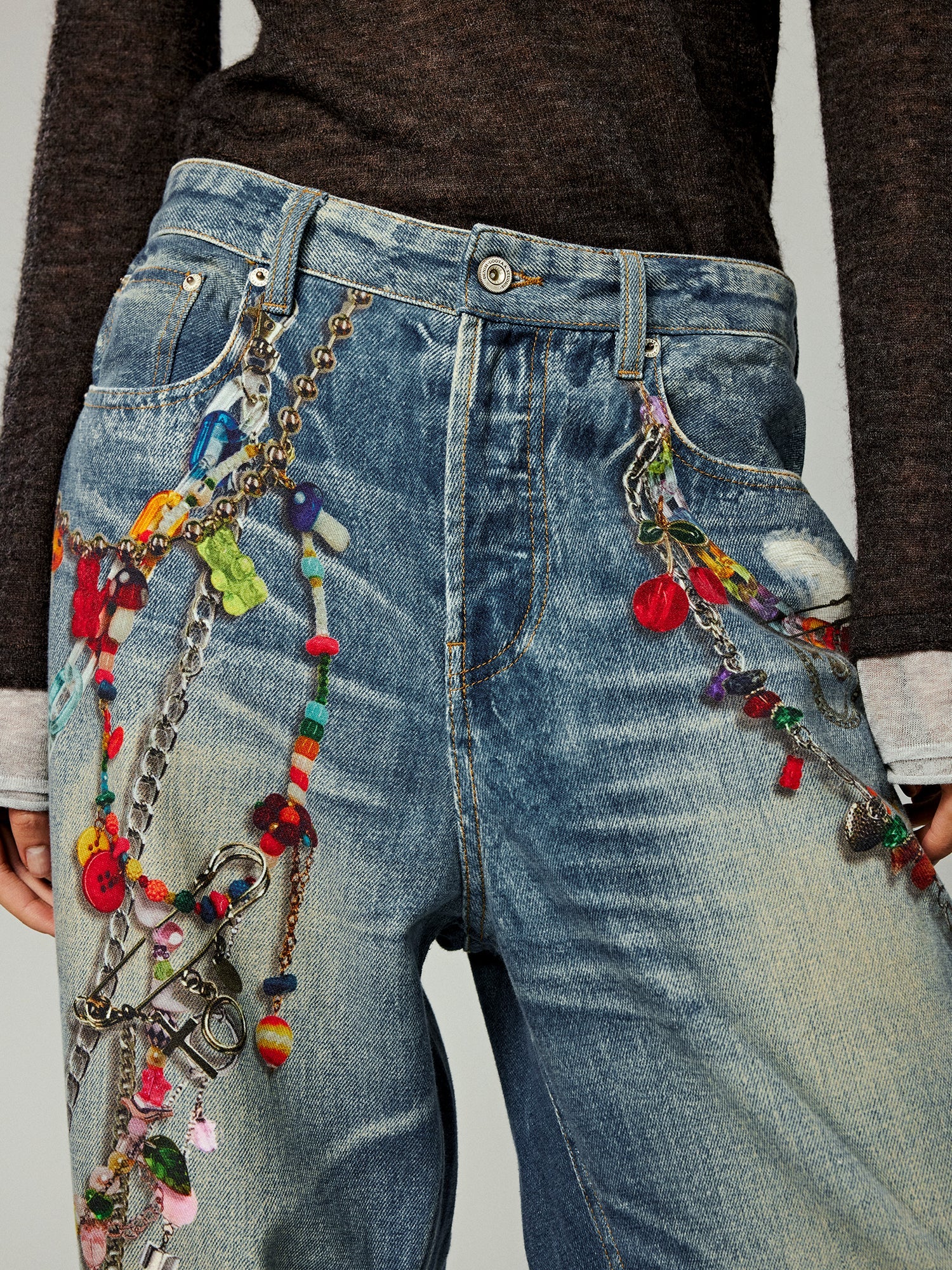 Trompe l'oeil chain print jeans