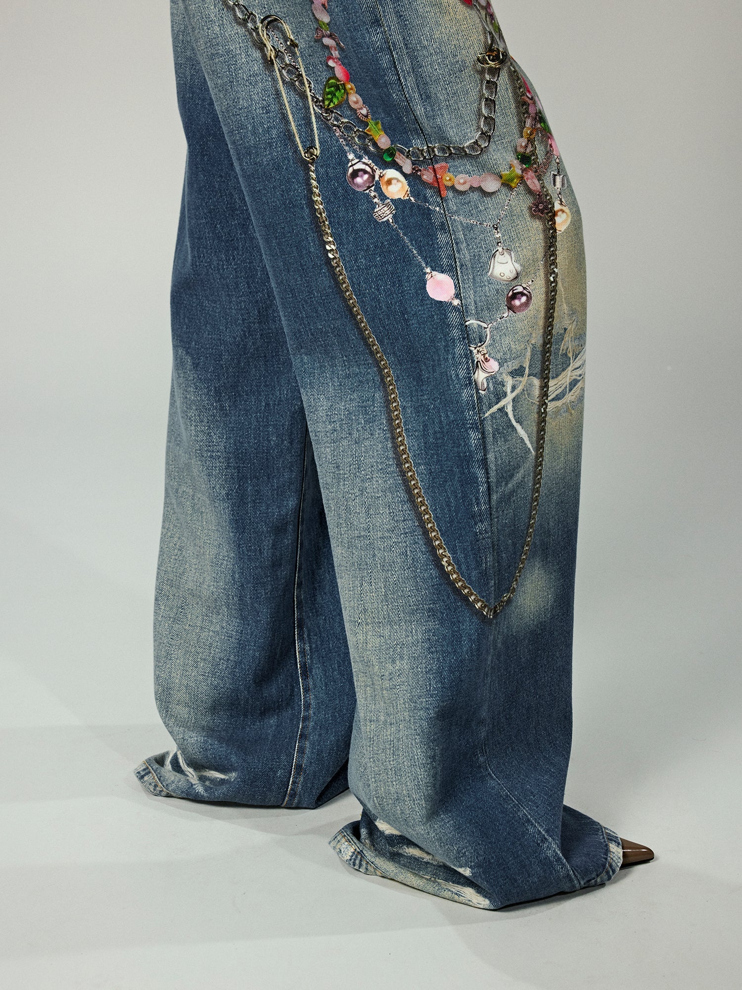 Trompe l'oeil chain print jeans