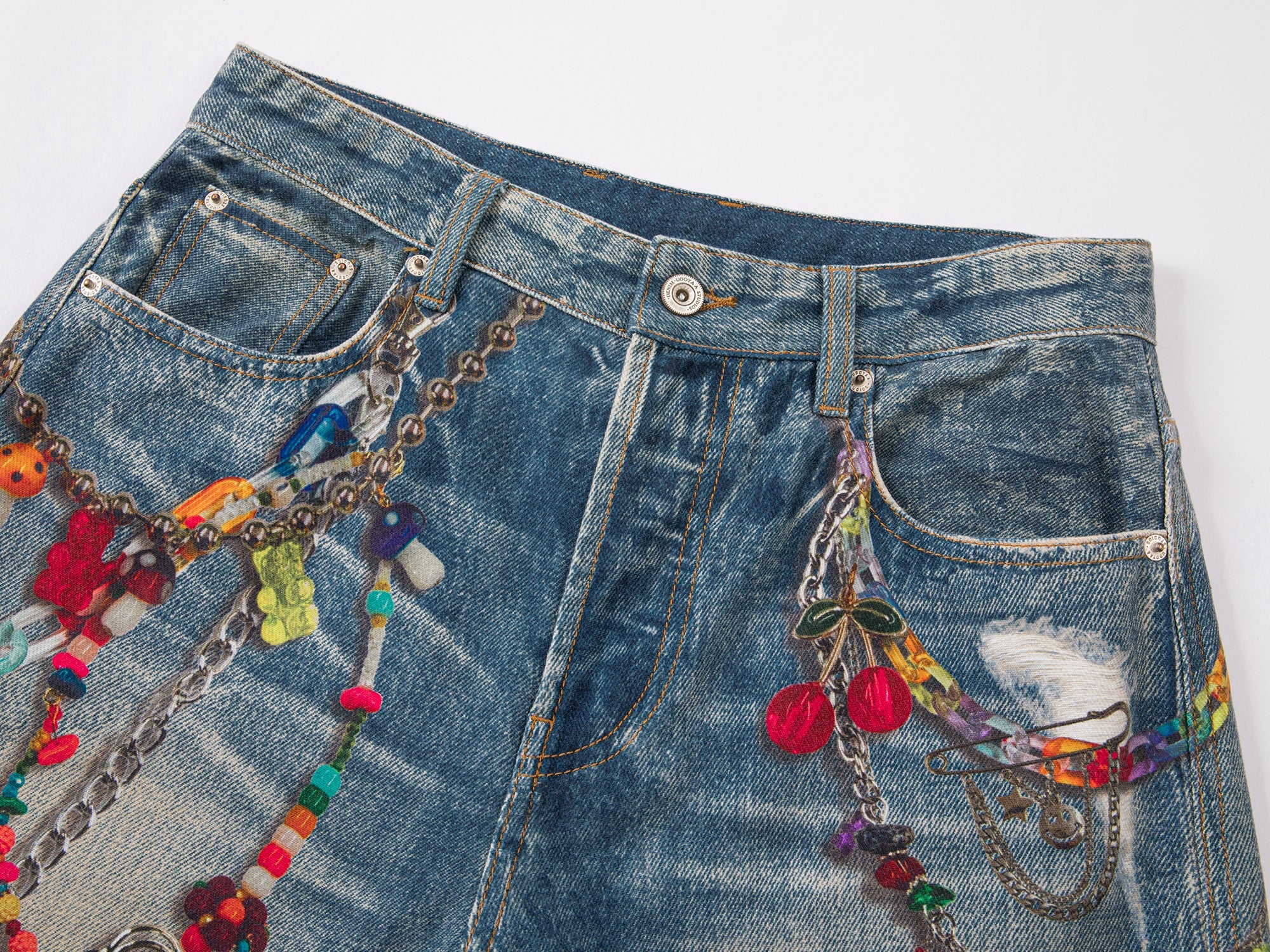 Trompe l'oeil chain print jeans