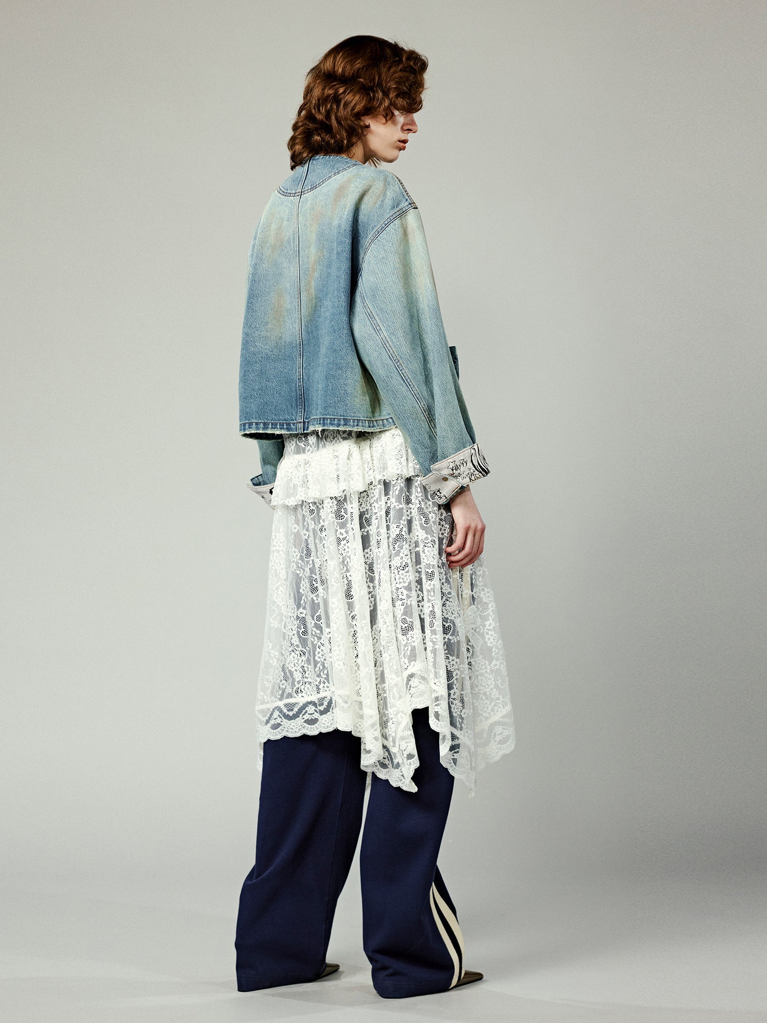 Denim jacket with bow fastenings