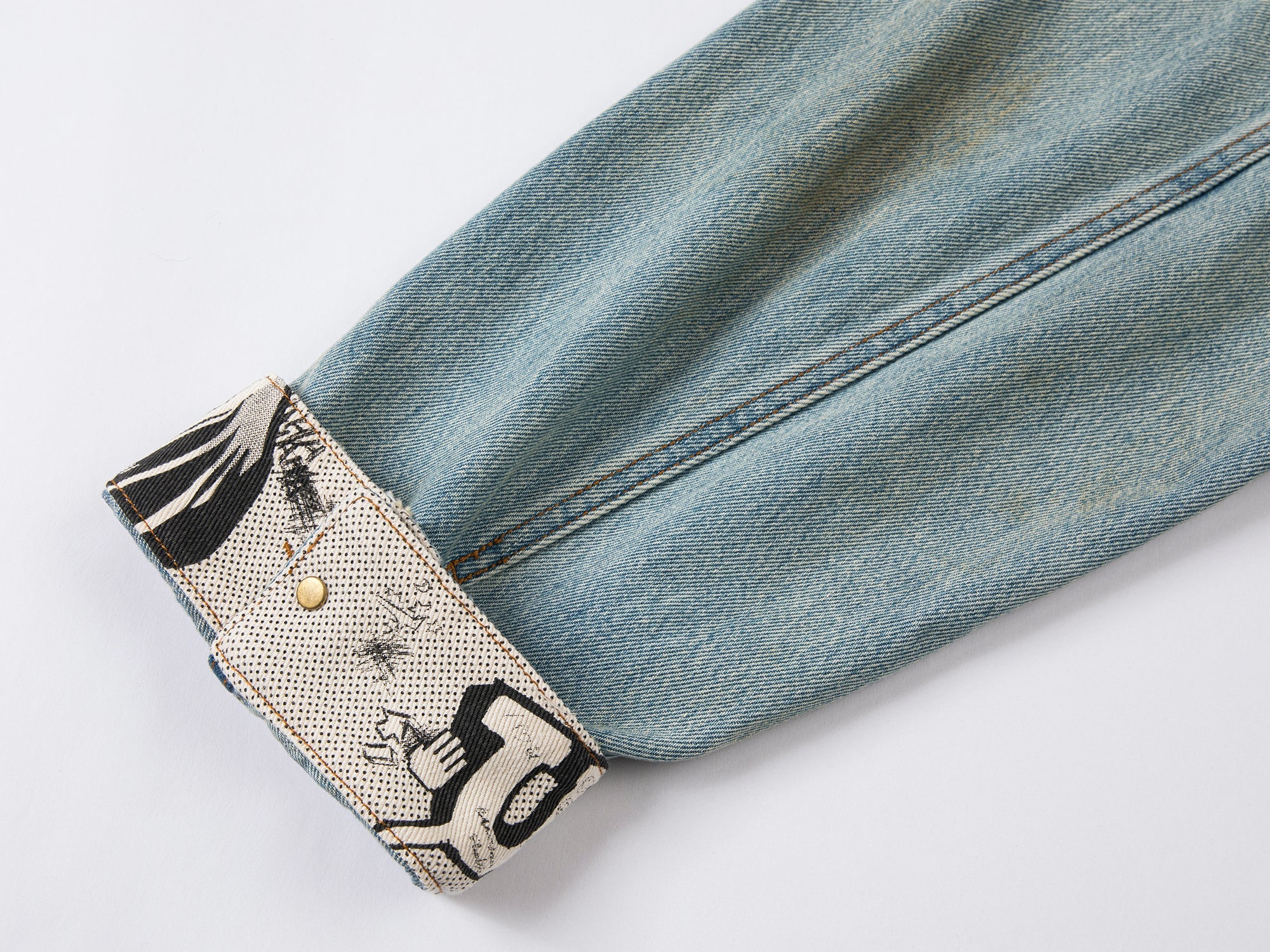 Denim jacket with bow fastenings