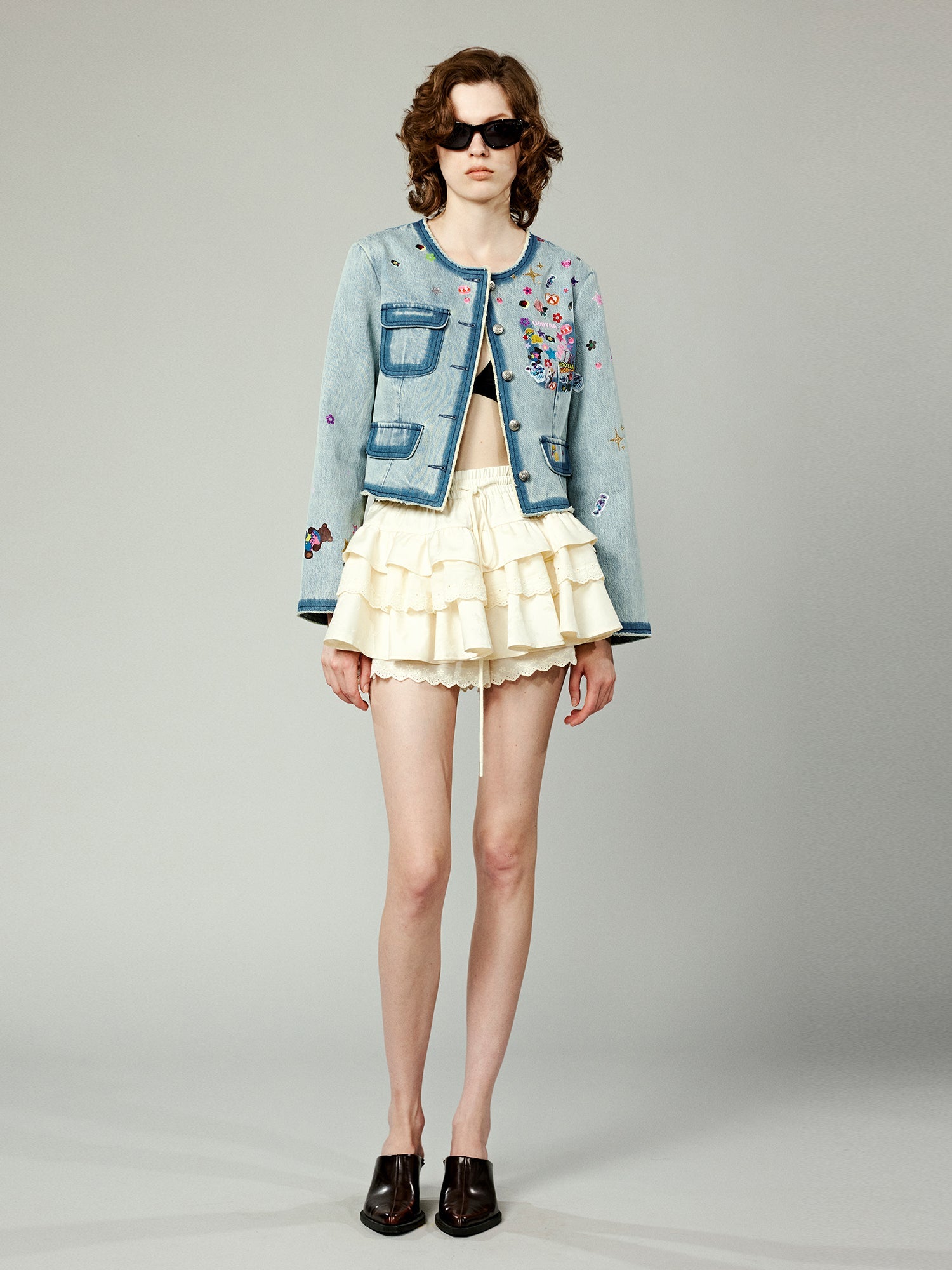 Playful sticker chanel style denim jacket